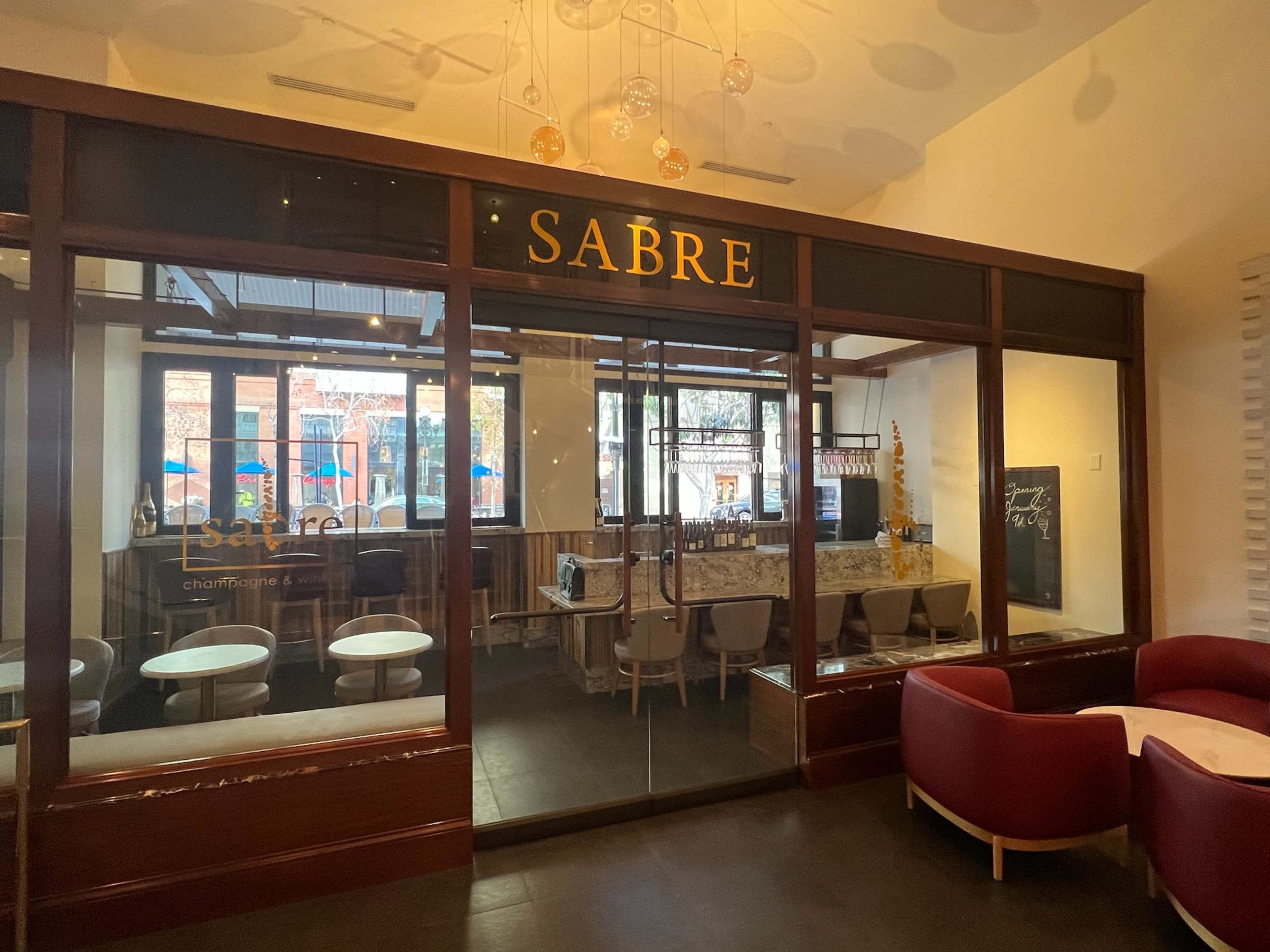 Chic space featuring an elegant wine bar with outdoor patio seating Image in Asian Pacific Thematic Historic District, San Diego, CA