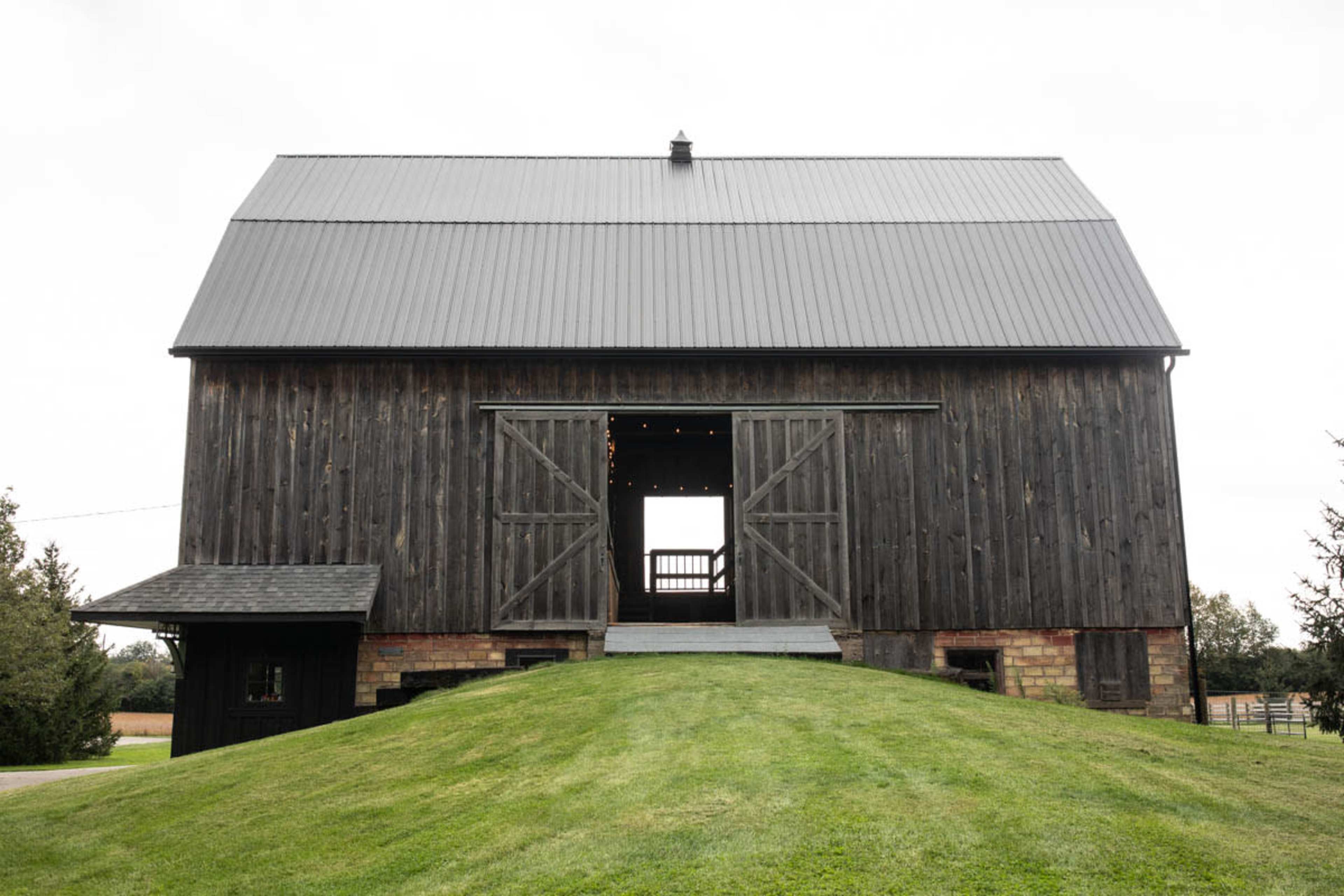 Hobby farm with large historic barn with rustic studio space and a cozy country cabin. Image in Brant, Caledonia, ON