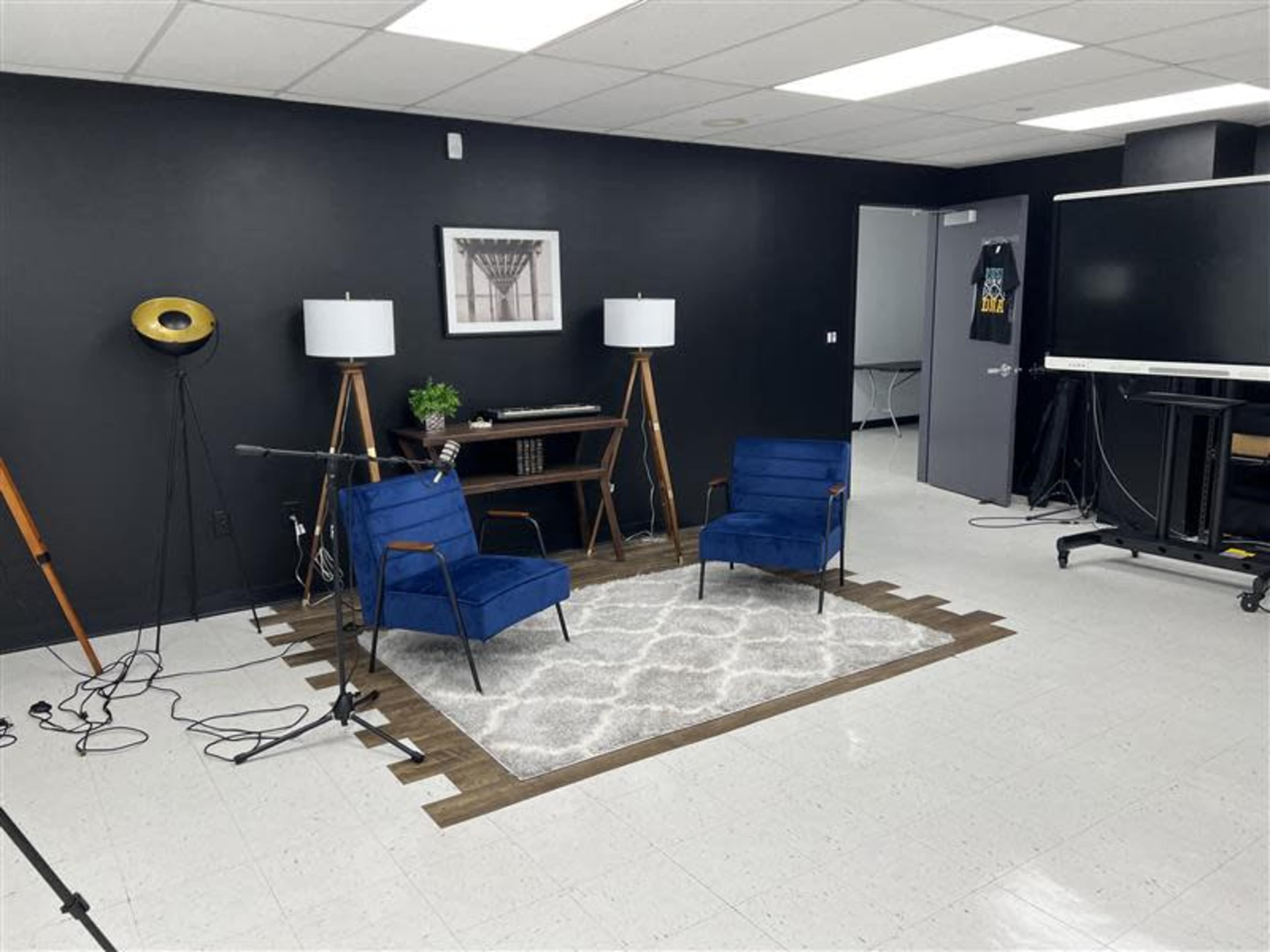 Our fully equipped Media Room is designed for high-quality podcast and video production. The space includes installed professional cameras, lighting, microphones, and audio interfaces — everything needed for recording interviews, podcasts, and creative content. Whether you're a solo creator or a team, the room is plug-and-play ready to support your production needs. Image in Hempstead, Hempstead, NY