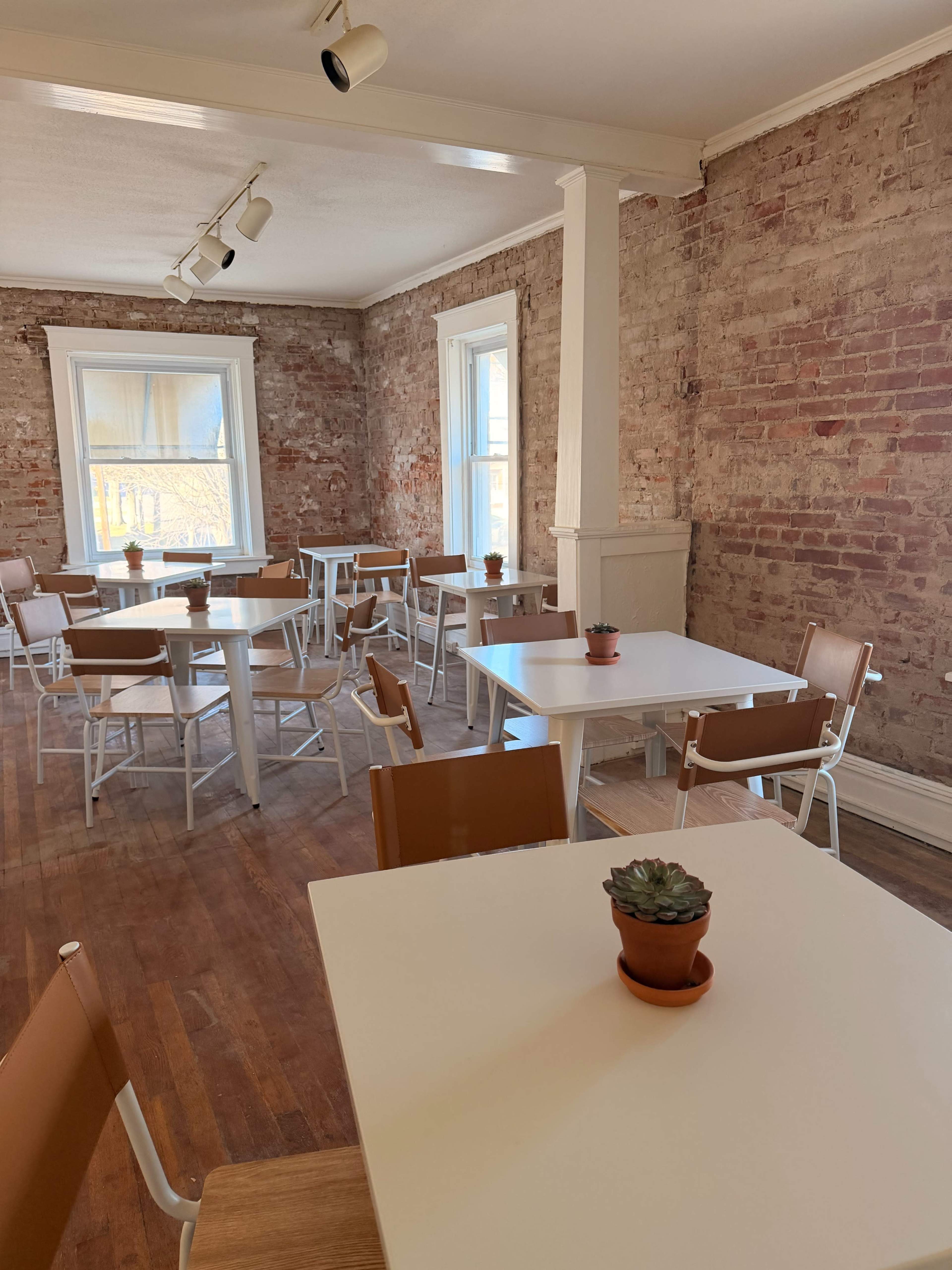 Cozy Upstairs Meeting Space with Lunch Options Downstairs Image in Hadley Township, Maplewood, MO