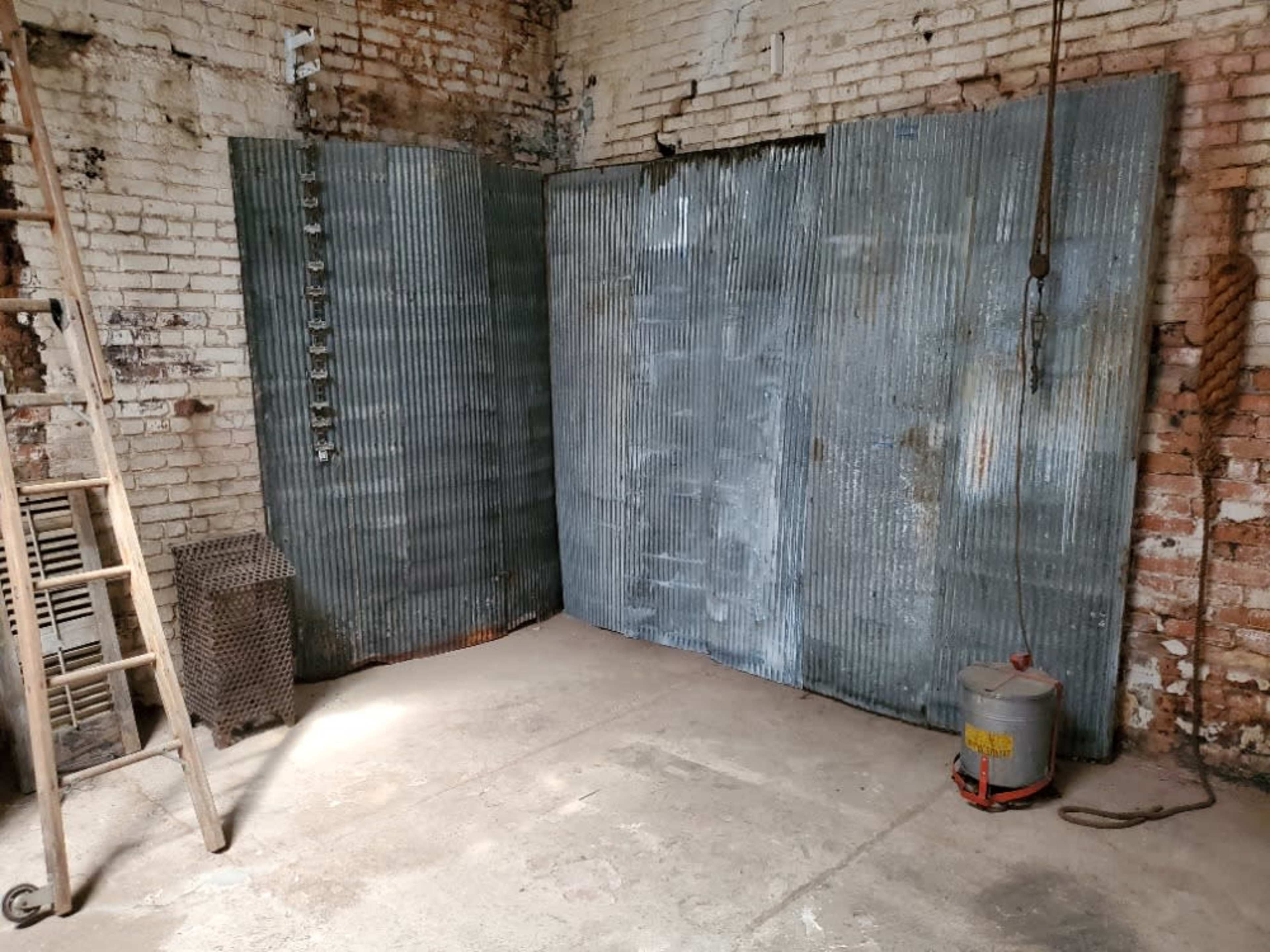 Corrugated distressed steel panels