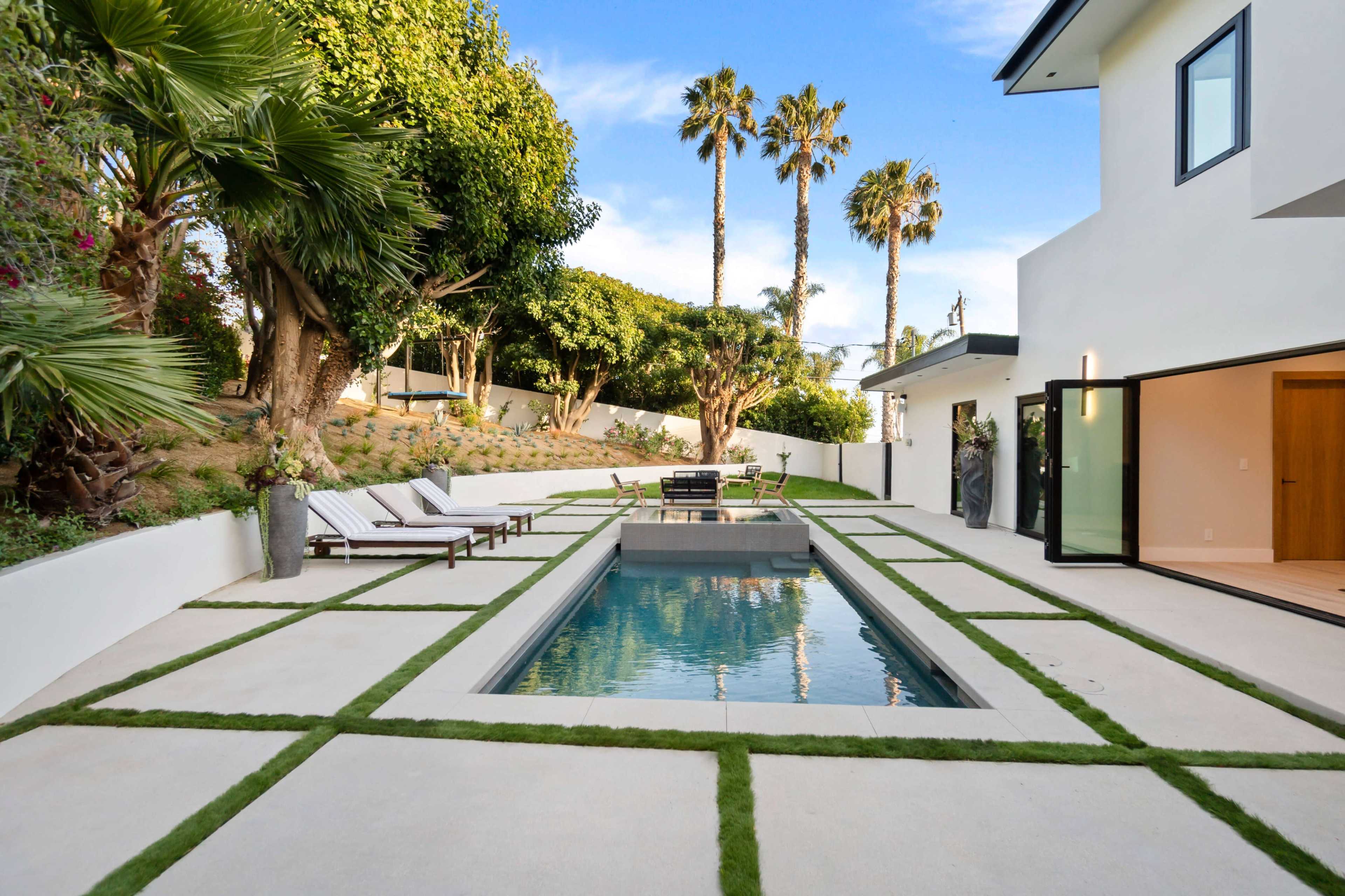 SLEEK MODERN SEA VIEW ESTATE POOL, COURT & VIEWS Image in Central Malibu, Malibu, CA