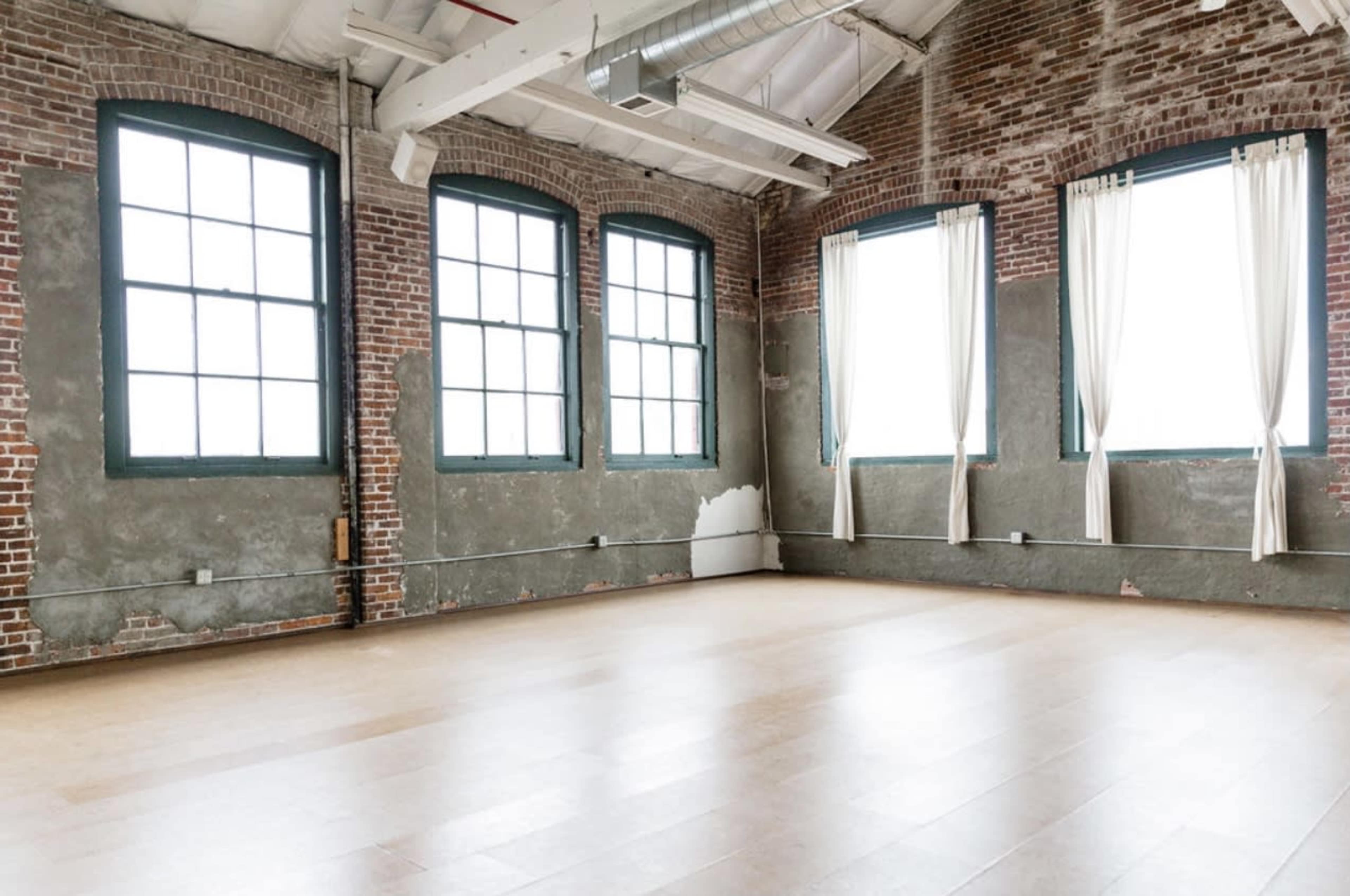 Natural light studio with exposed brick in NE portland perfect for photography, yoga, meetings, and more... Image in Northeast Portland, Portland, OR