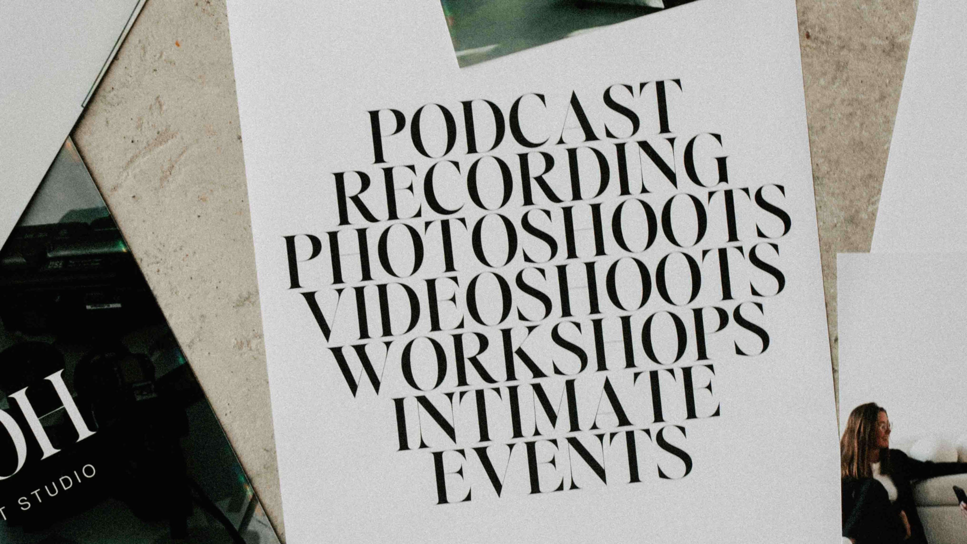 The image features a collection of words emphasizing services offered, including "Podcast Recording," "Photoshoots," "Videoshoots," "Workshops," and "Intimate Events," arranged prominently on a textured background.