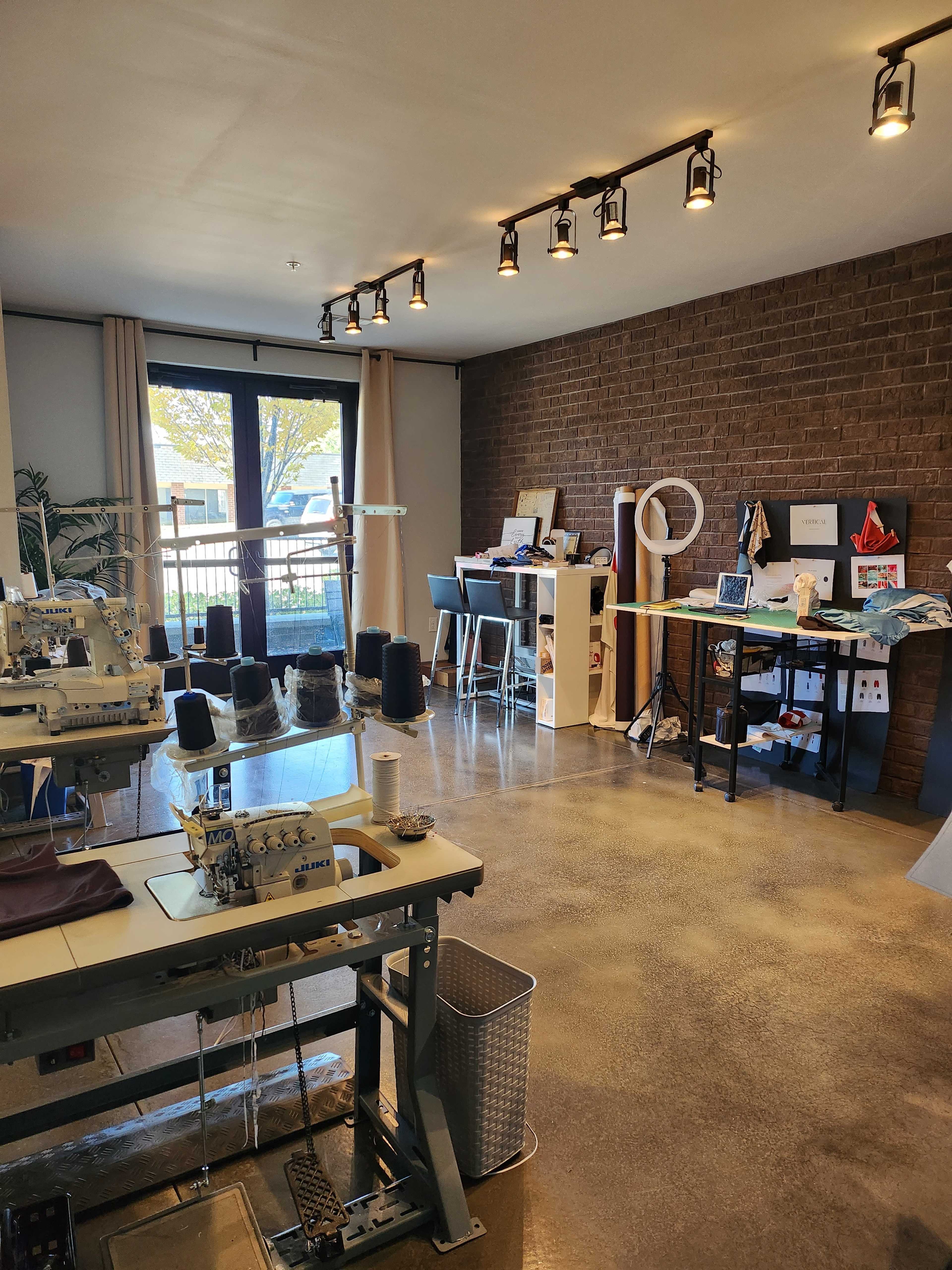 Intimate Sewing Studio with Industrial Machines & Photography Wall Image in Duluth, Duluth, GA