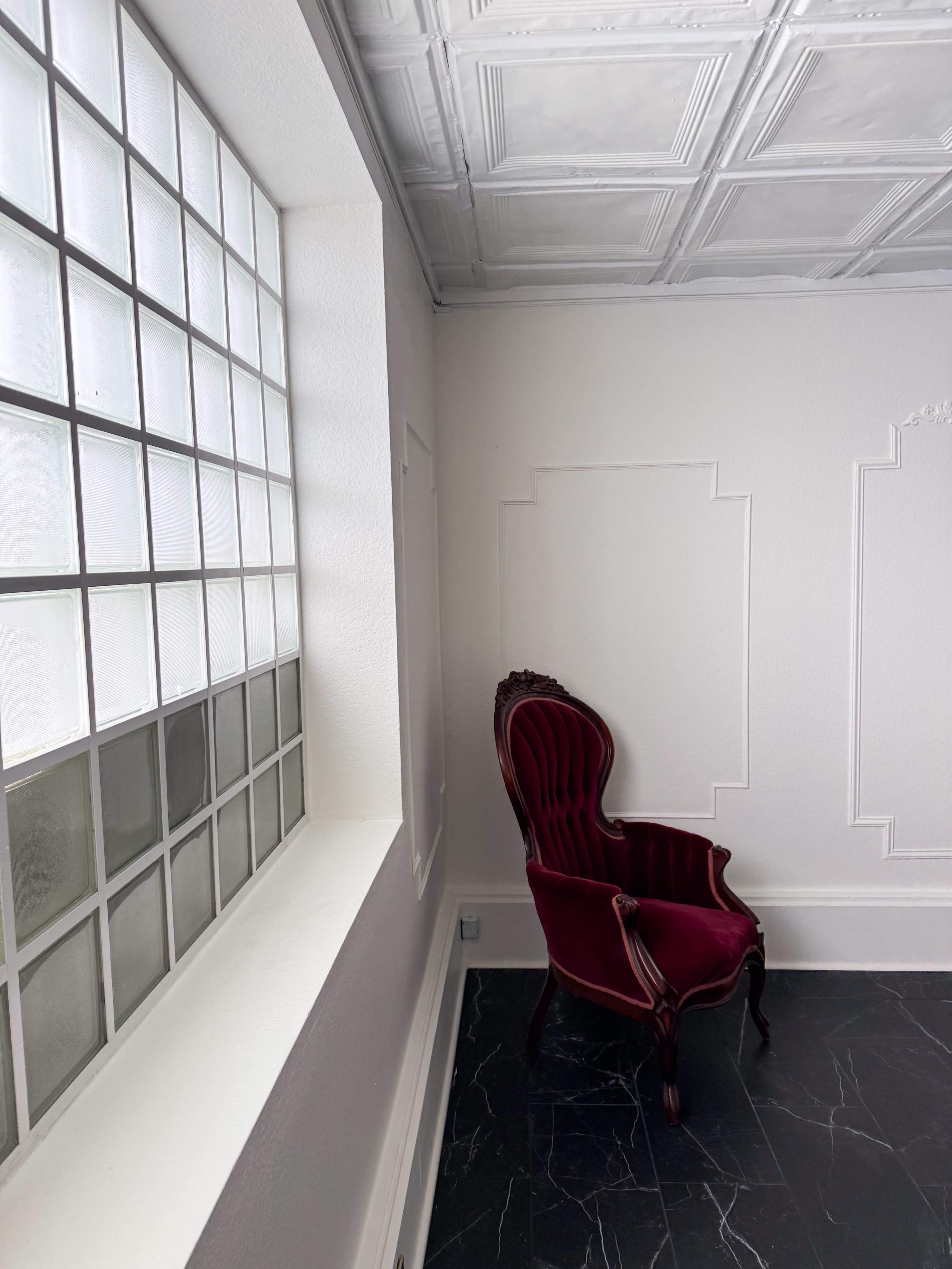 The Parisian Parlor at Archive Haus | a Natural Light all white European Style Studio Steps from the Denton Square Image in Denton, Denton, TX