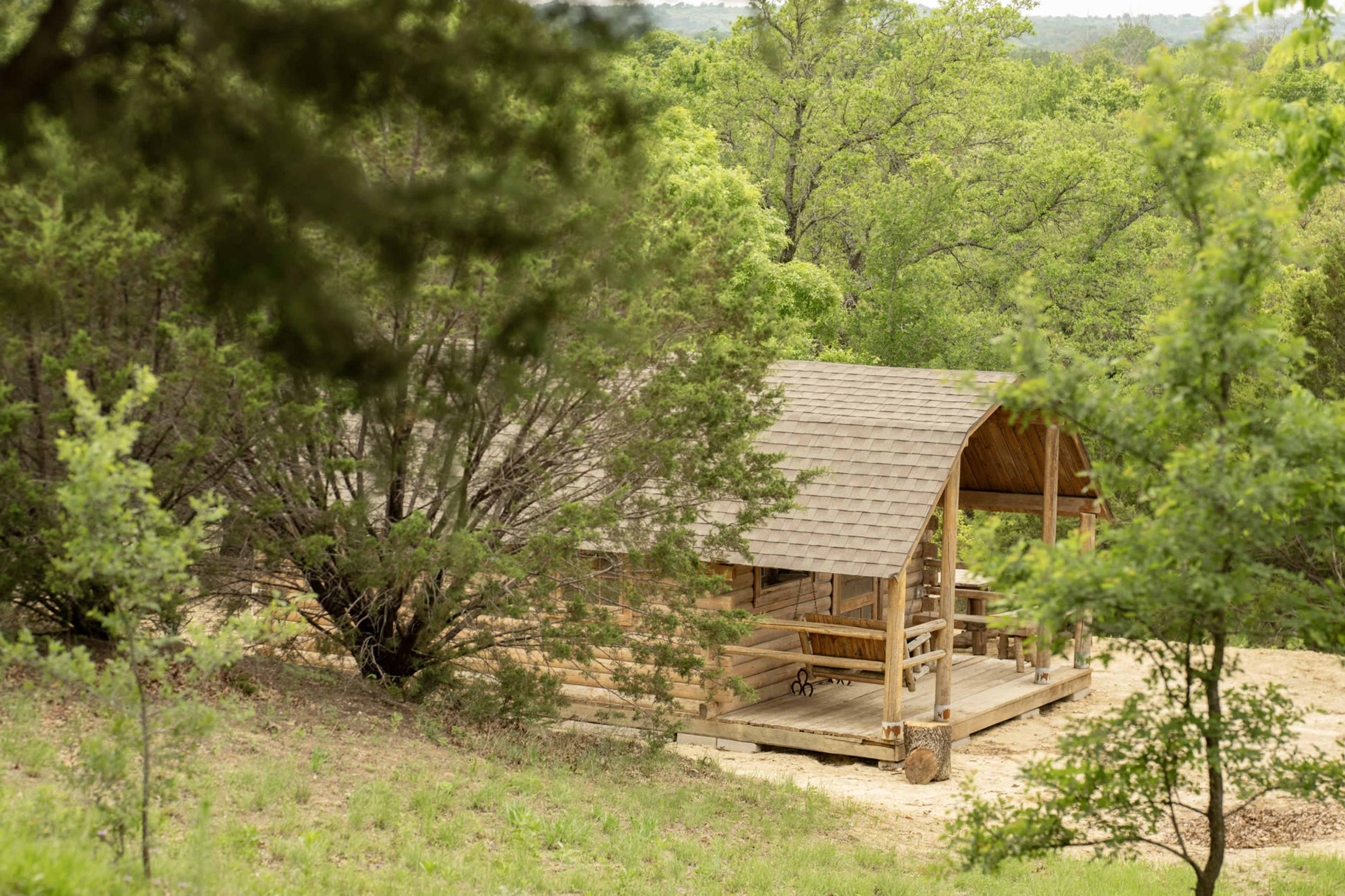 Little Artist Cabin in the Woods with Authentic Clawfoot tub Image in , Fort Worth, TX