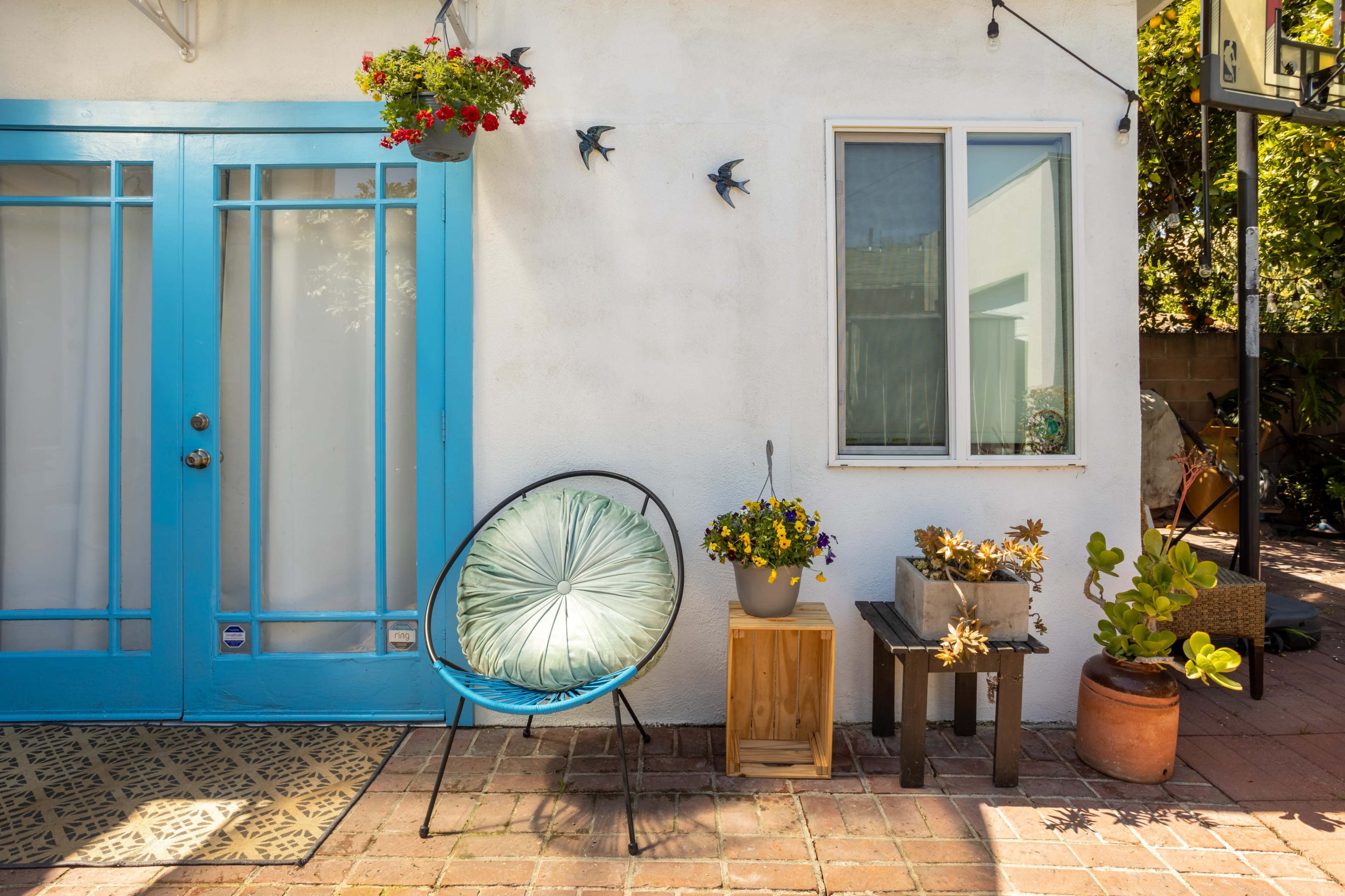Zen Backyard filled with plants and fruit trees near DTLA Image in Jefferson Park, Los Angeles, CA