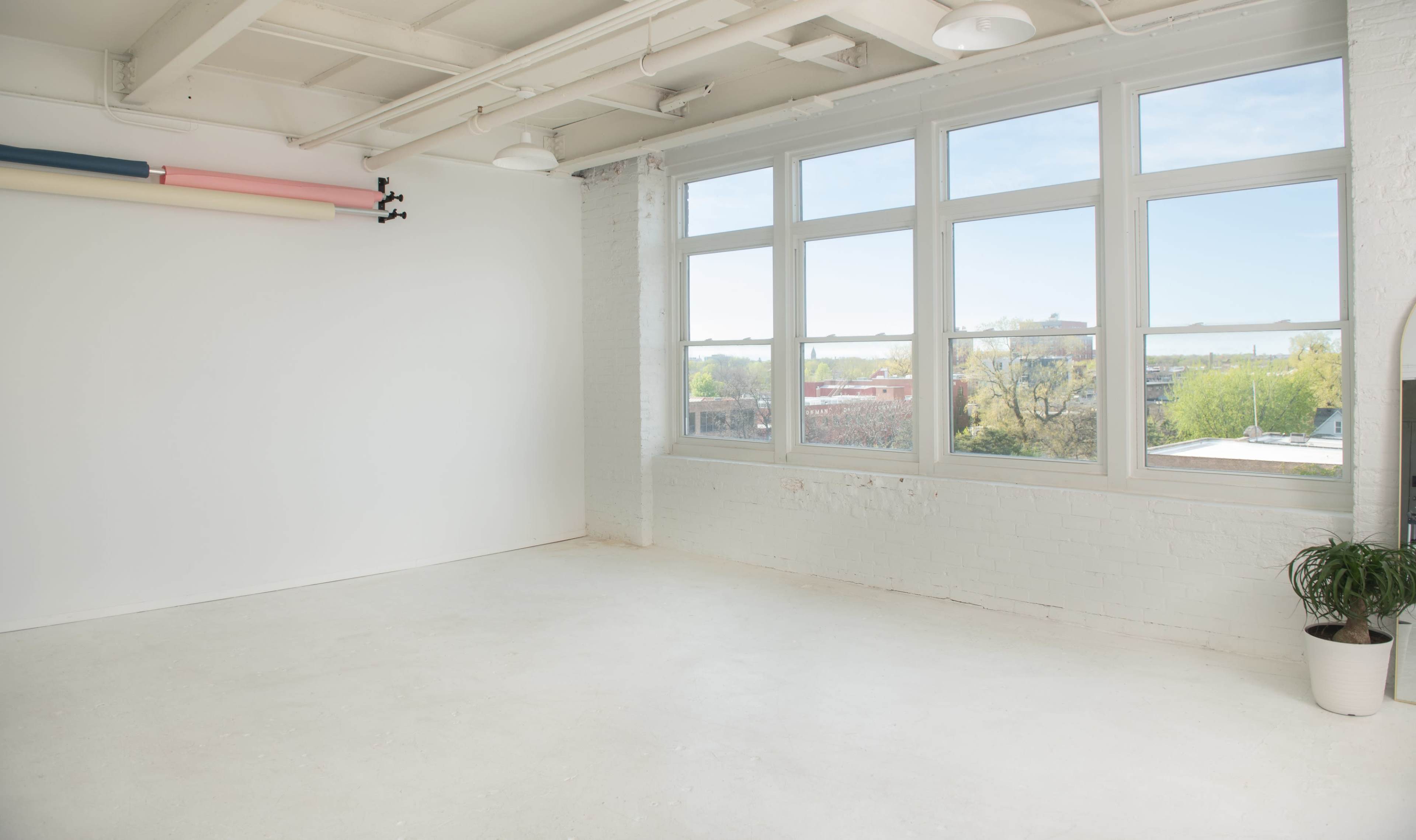 Airy White Loft Studio with Skyline North-Facing Windows Image in Lake View, Chicago, IL