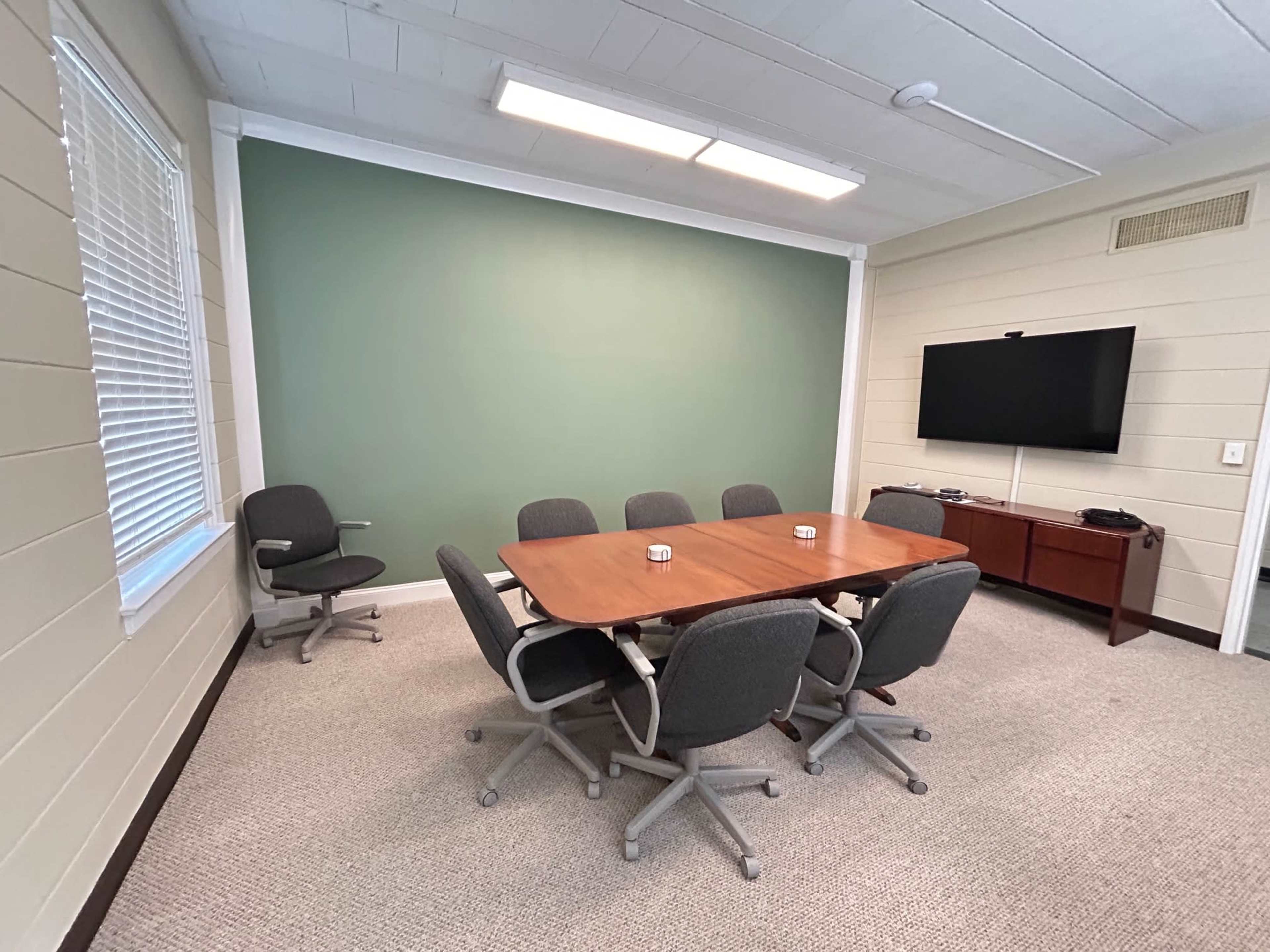 Modern Conference Room for 8 | TV + Whiteboard | Ideal for Meetings & Presentations Image in Hillwood, Nashville, TN