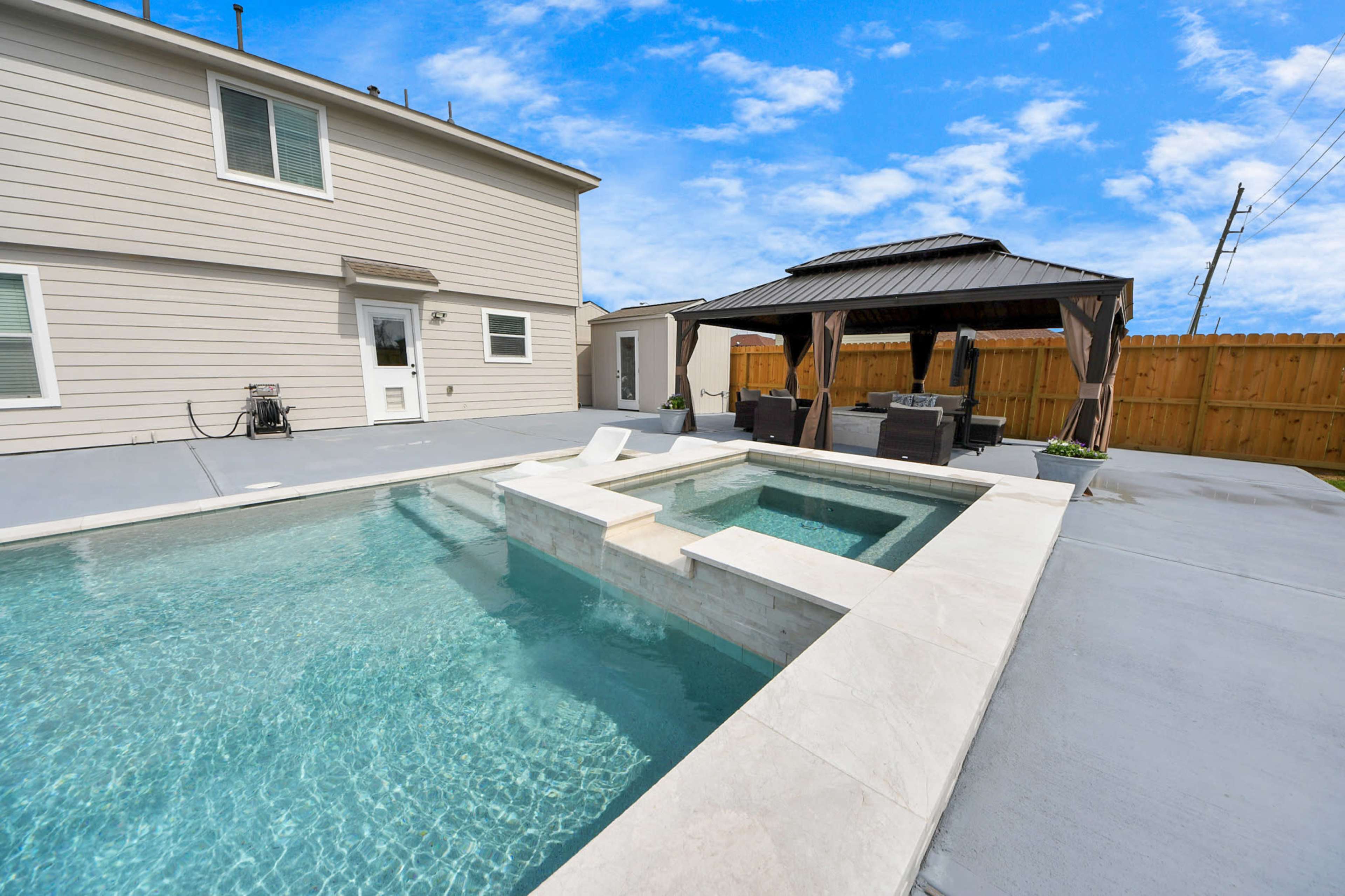 Near IAH airport spacious backyard with pool and firepit for celebrations and parties to memorable movie nights with family! Image in Humble, Humble, TX