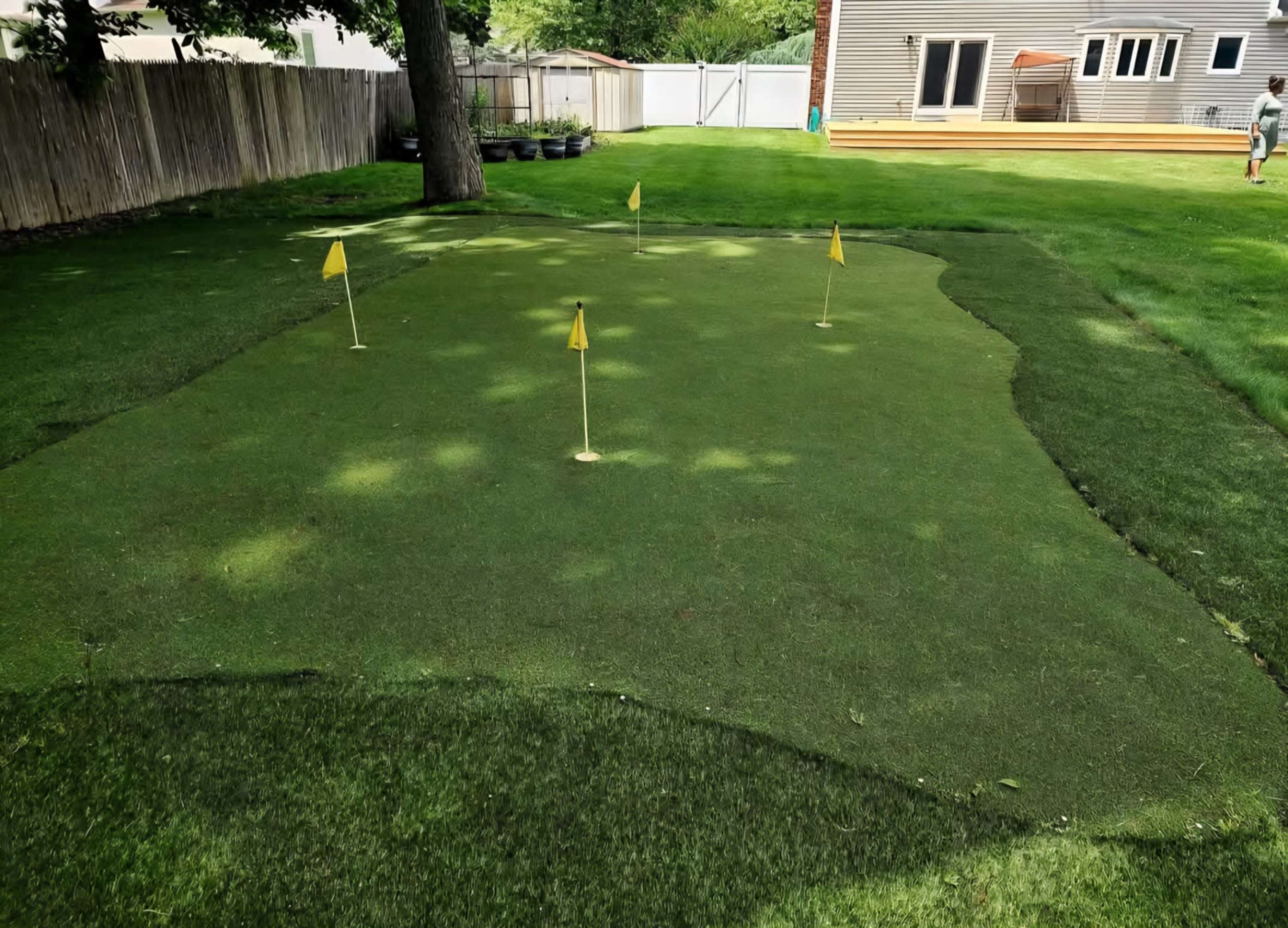 Elegant Backyard Escape with Ambient Lighting with Stage Image in Babylon, Wheatley Heights, NY