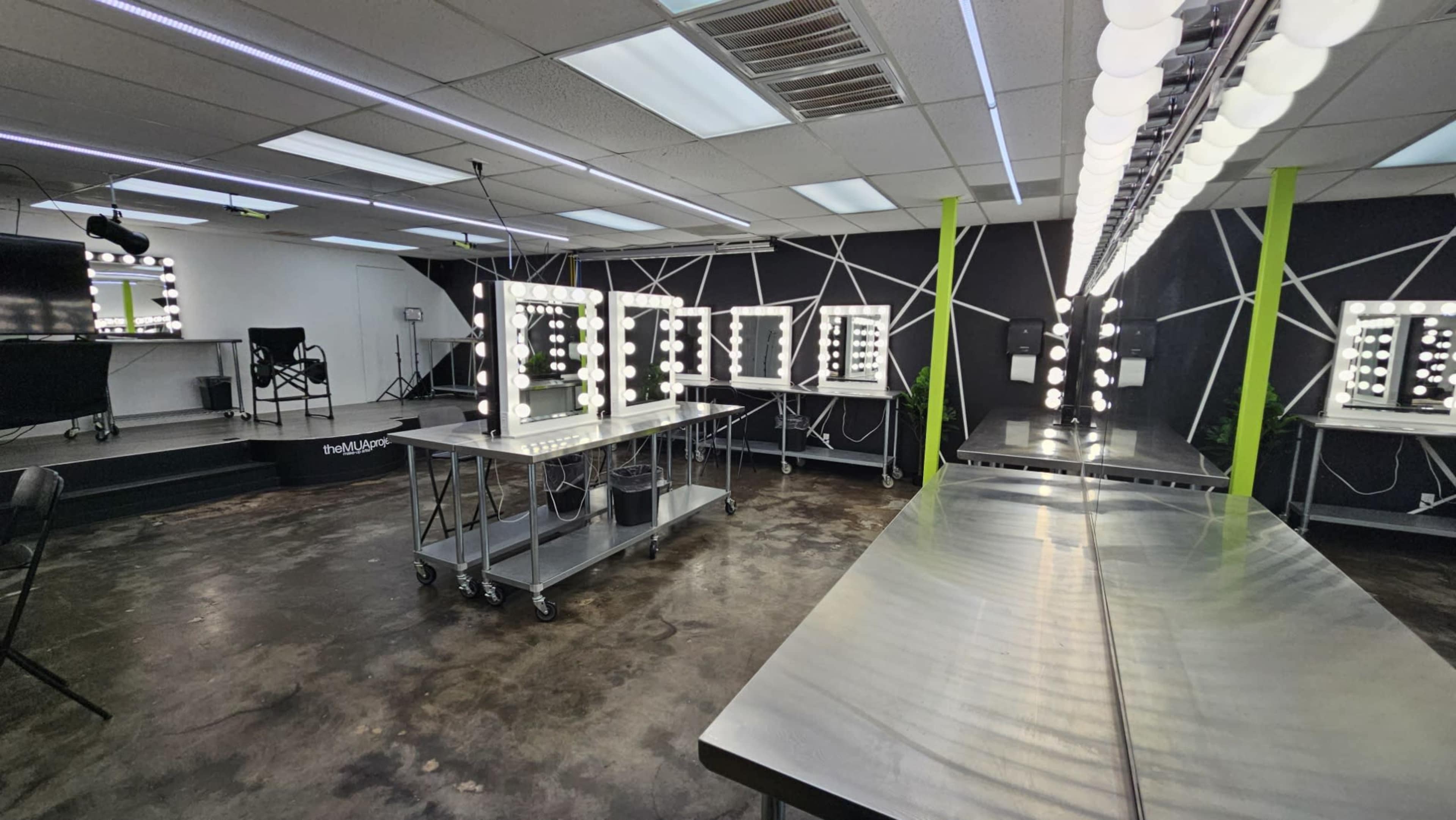 Clean, bright, open studio or classroom with Hollywood Vanities and barstool chairs Image in Westside, Houston, TX