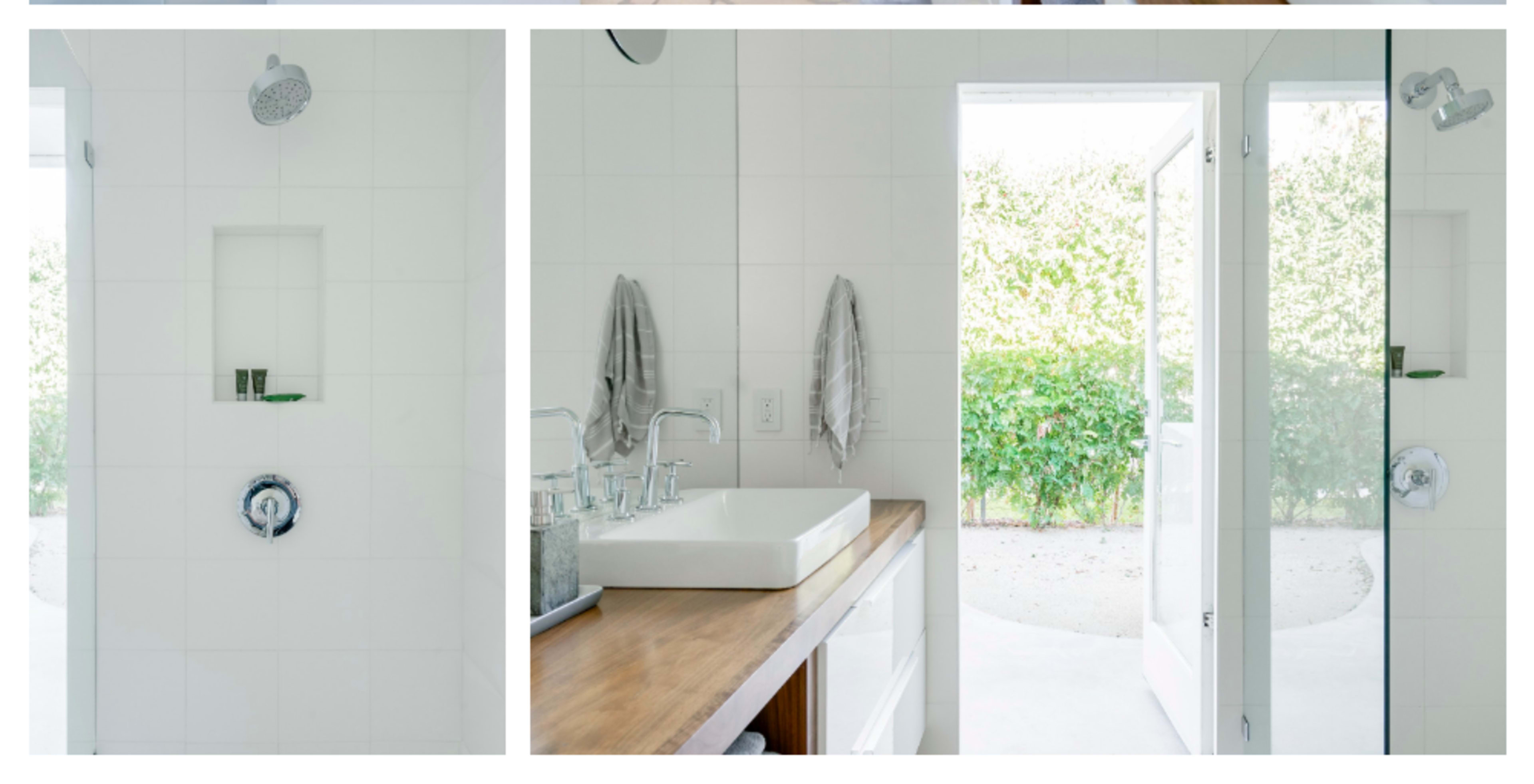 A modern bathroom featuring a glass shower, a wooden vanity with a sink, and an open door leading to a garden area.