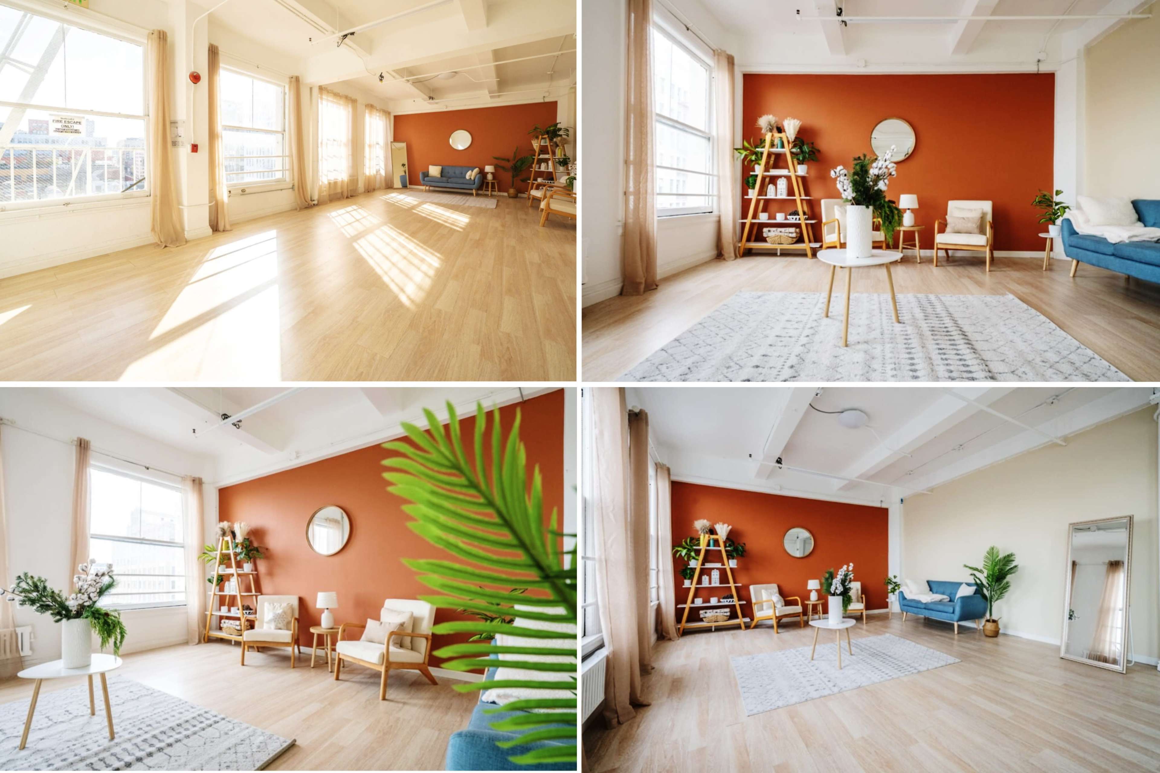 A bright, minimalist interior space featuring large windows, light wooden floors, an orange accent wall, and simple furniture arrangements.