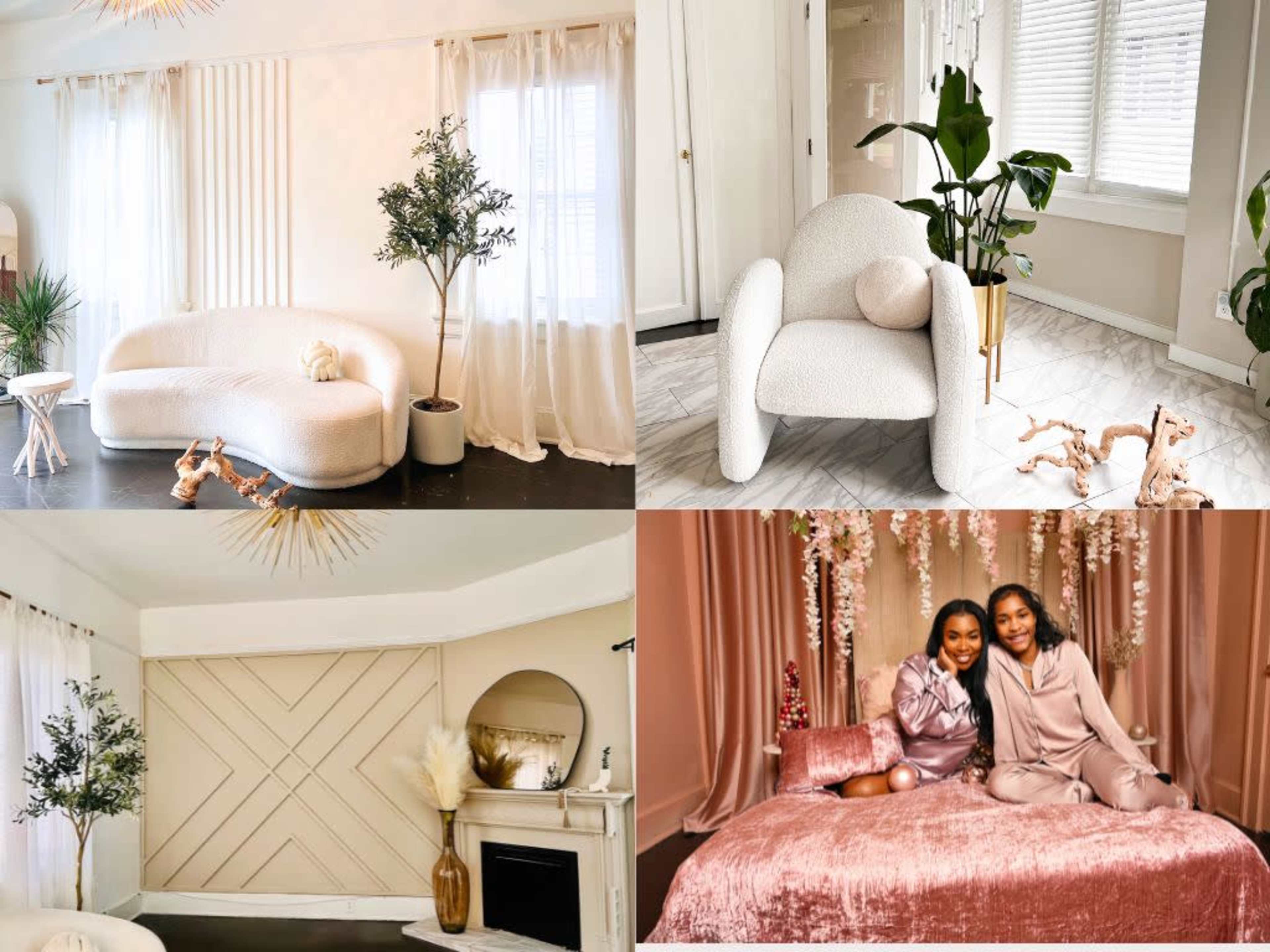 A cozy interior featuring a light-colored minimalist living space with plants, elegant furniture, and two women posing together on a plush sofa.