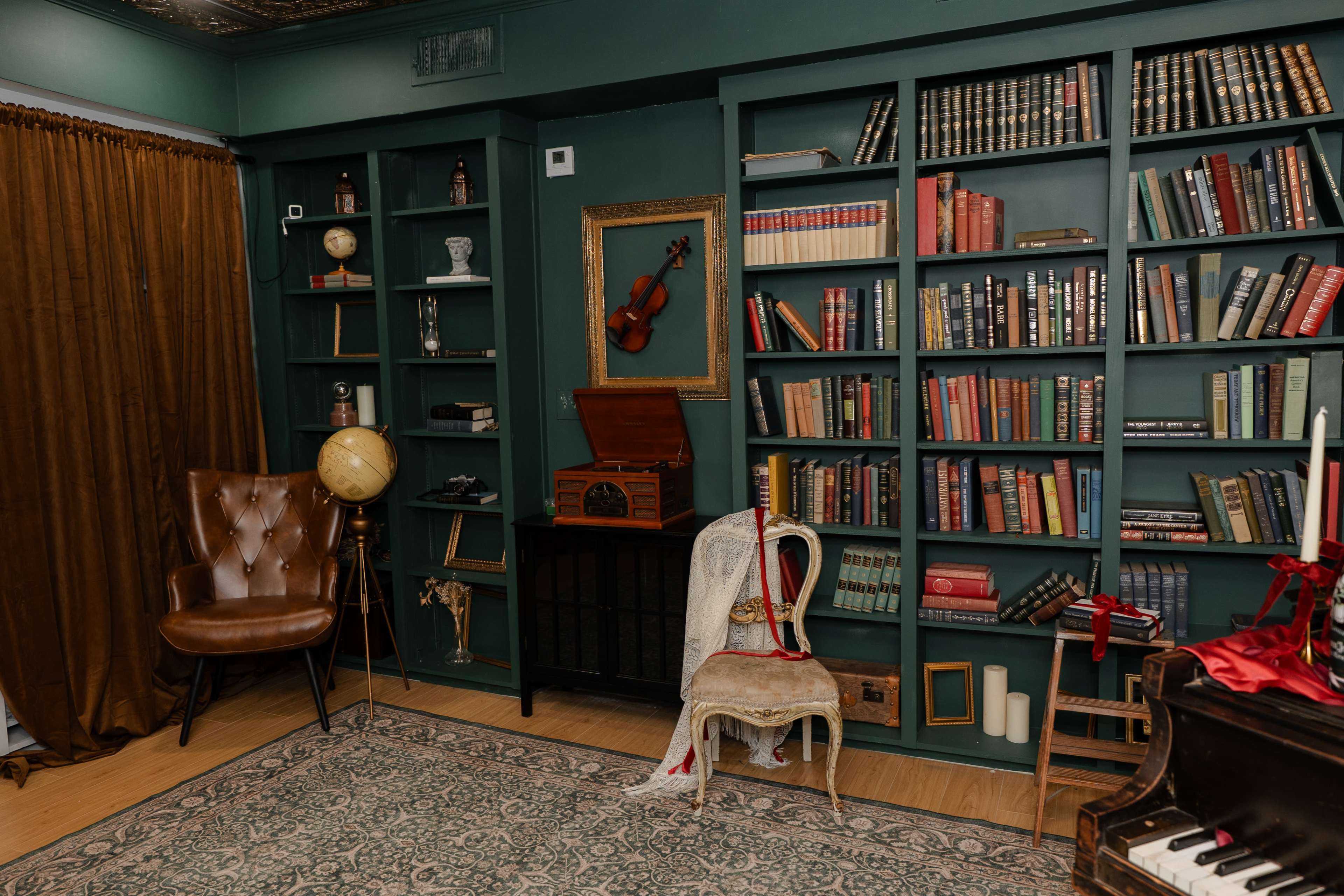 Natural Light Studio with Backdrop, Piano, and Bookshelf for Photo & Video Image in Peak's Suburban Addition, Dallas, TX