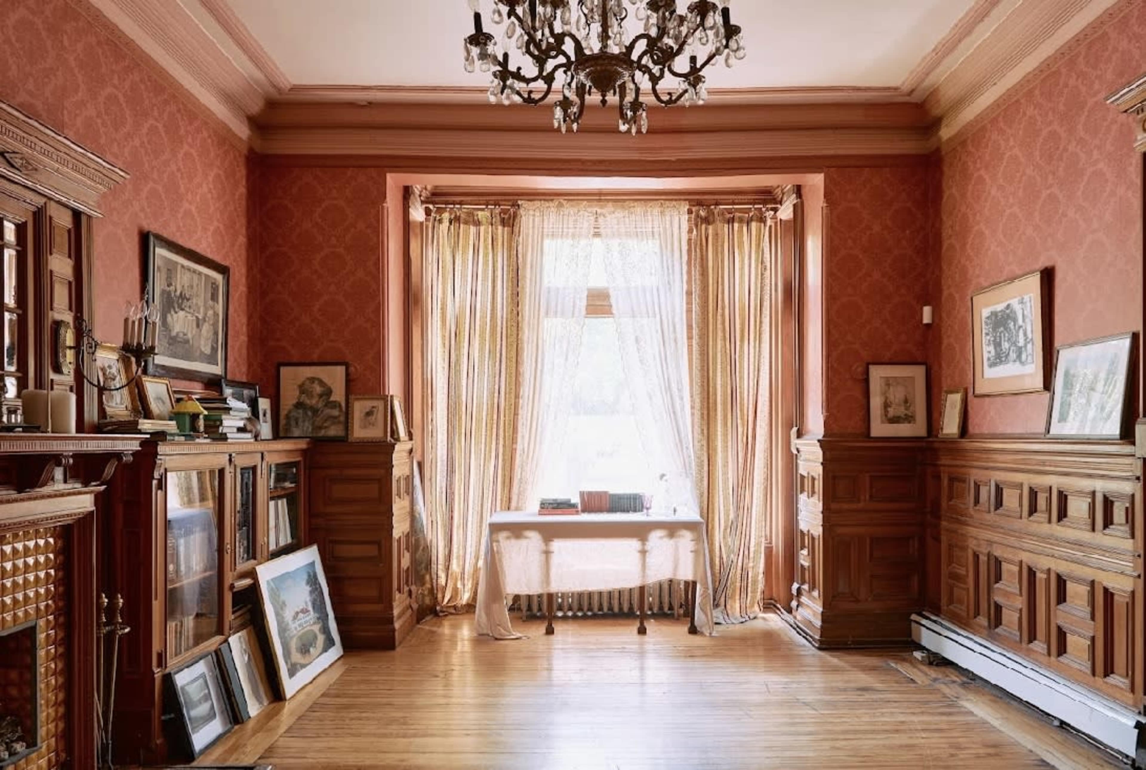 Classic Wallpapered Parlor Room with Fireplace and Wood Details Image in Bedford-Stuyvesant, Brooklyn, NY