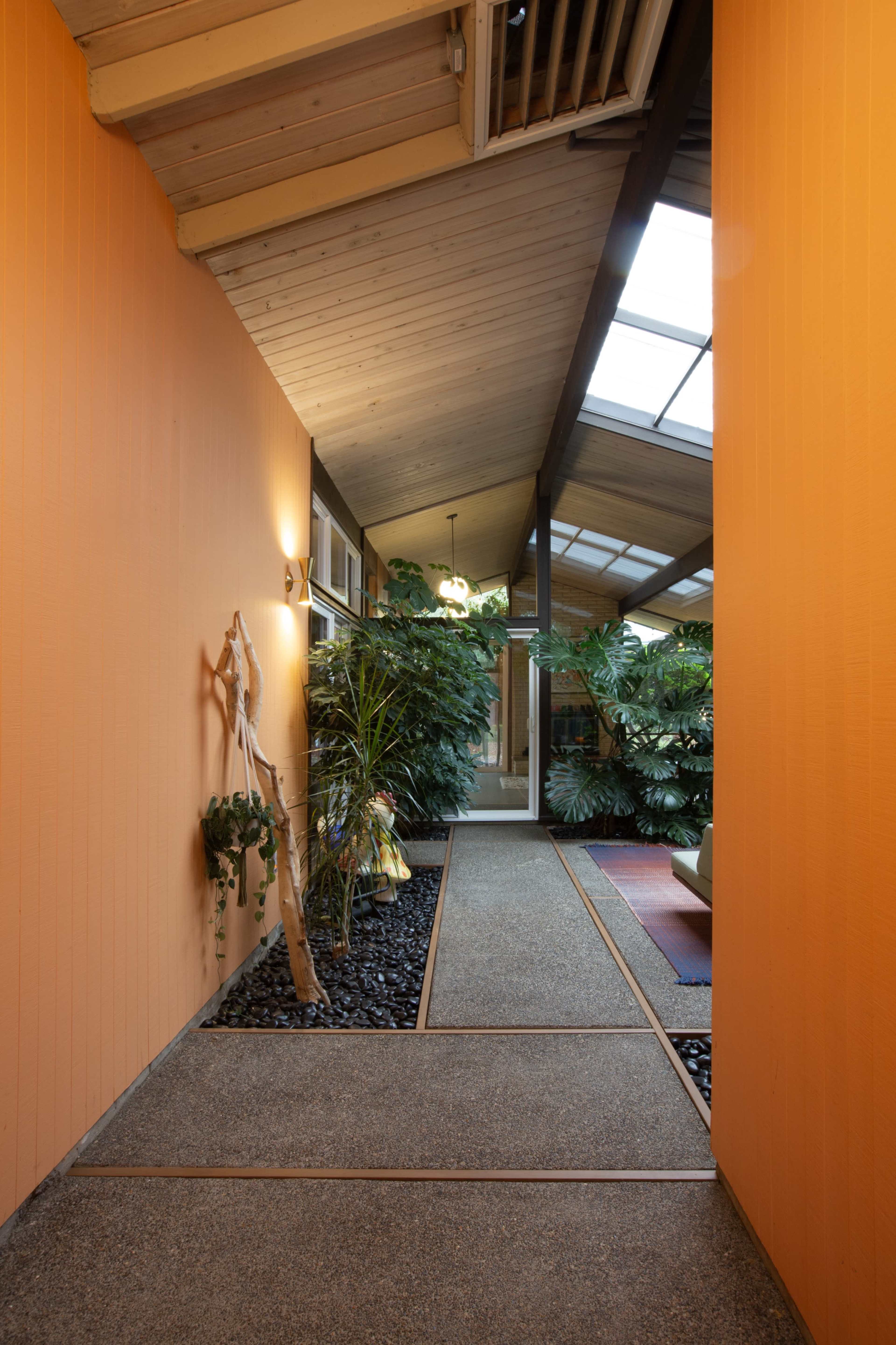 Mid-Century Rummer Atrium House with Lush Indoor Garden Image in Garden Home-Whitford, Portland, OR