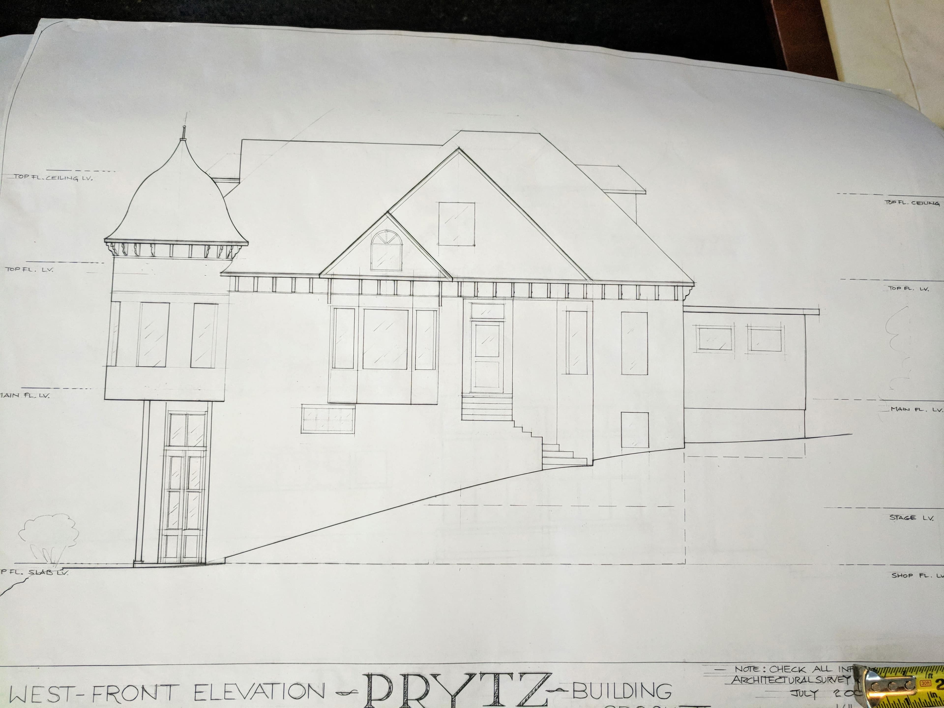 A detailed architectural drawing of the west front elevation of a building named "Prytz," featuring various windows and a turret-like structure.