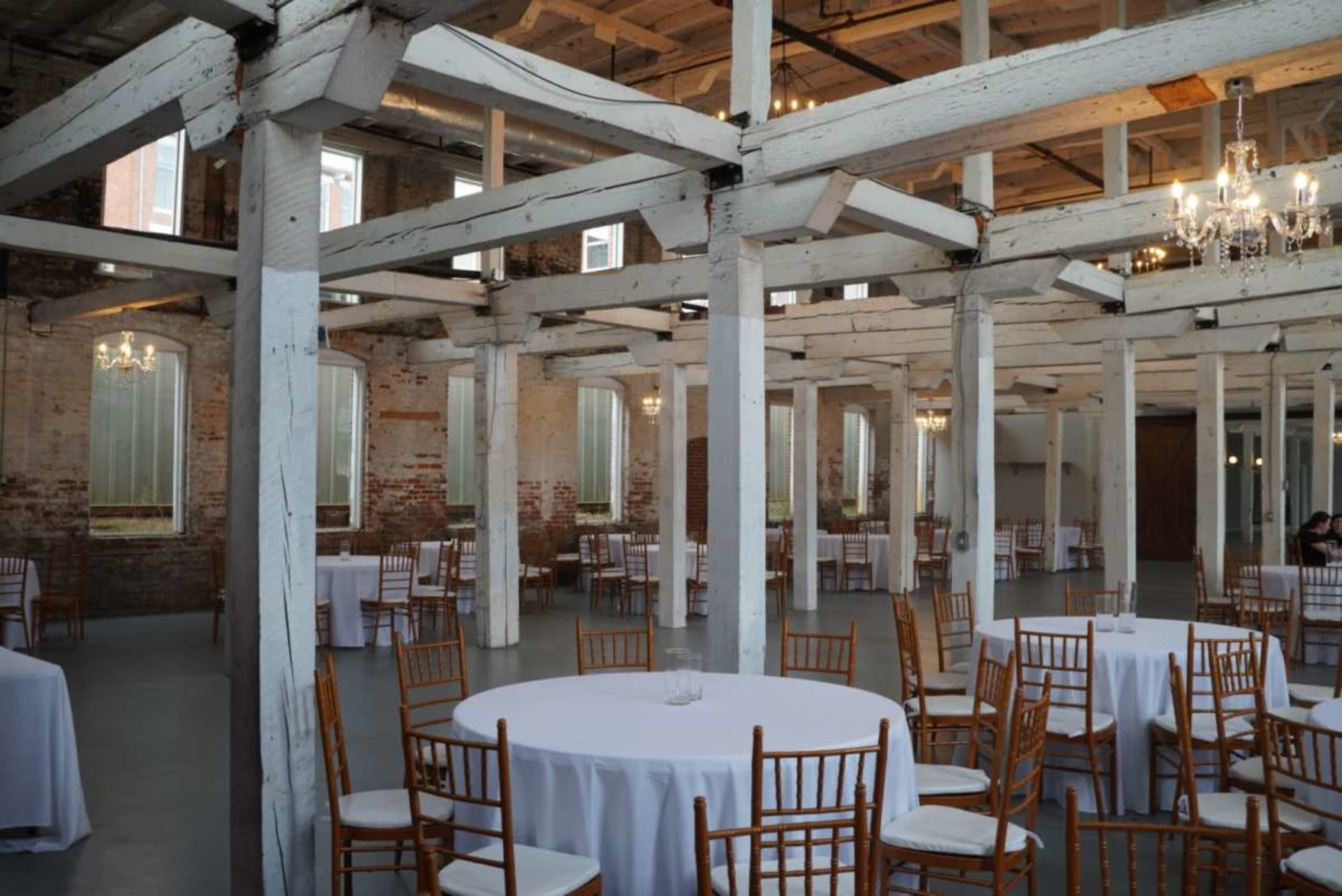 Historic Downtown Space with Exposed Brick and White Beams Image in Buford, Buford, GA