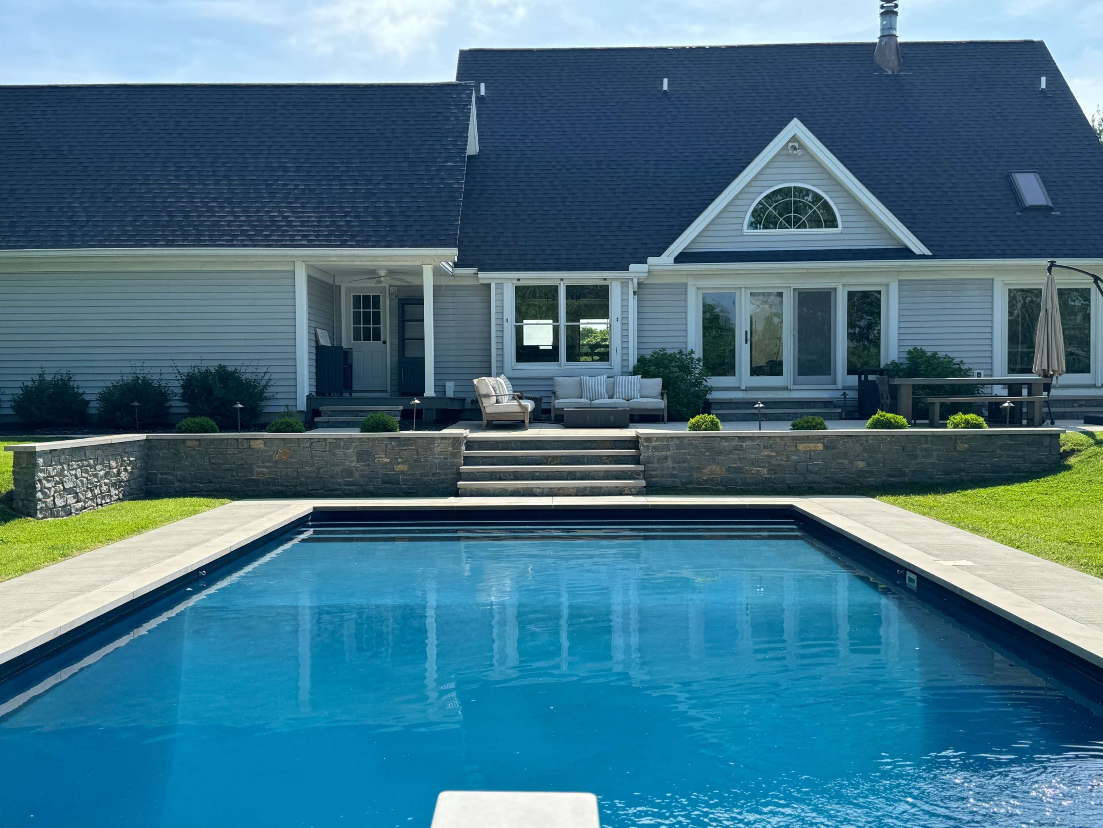 Beautiful modern farmhouse with amazing pool backyard space. Image in Colerain Township, Cincinnati, OH