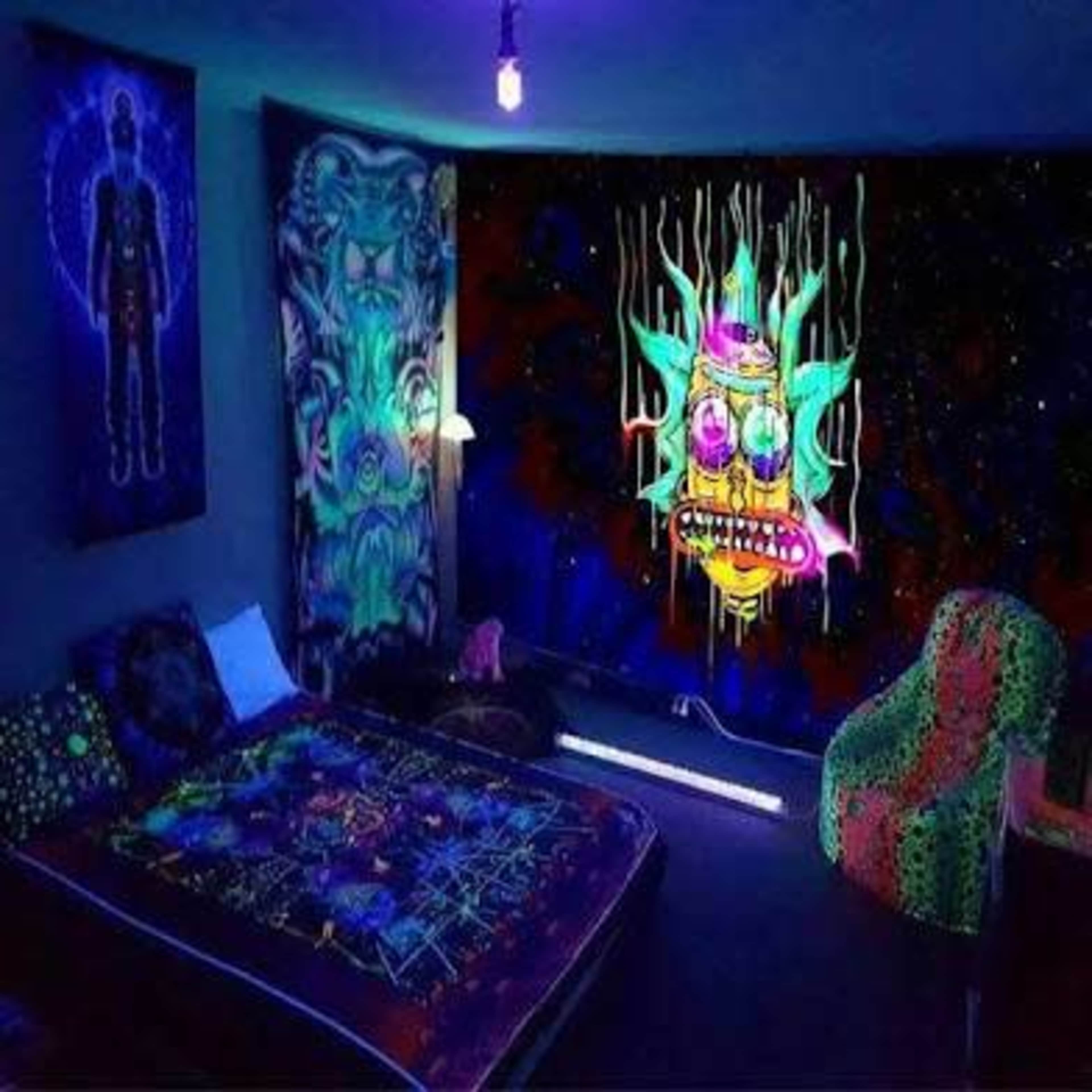 The image shows a vibrant room decorated with fluorescent art, including a colorful mural and patterned bedding, illuminated by a glowing light.