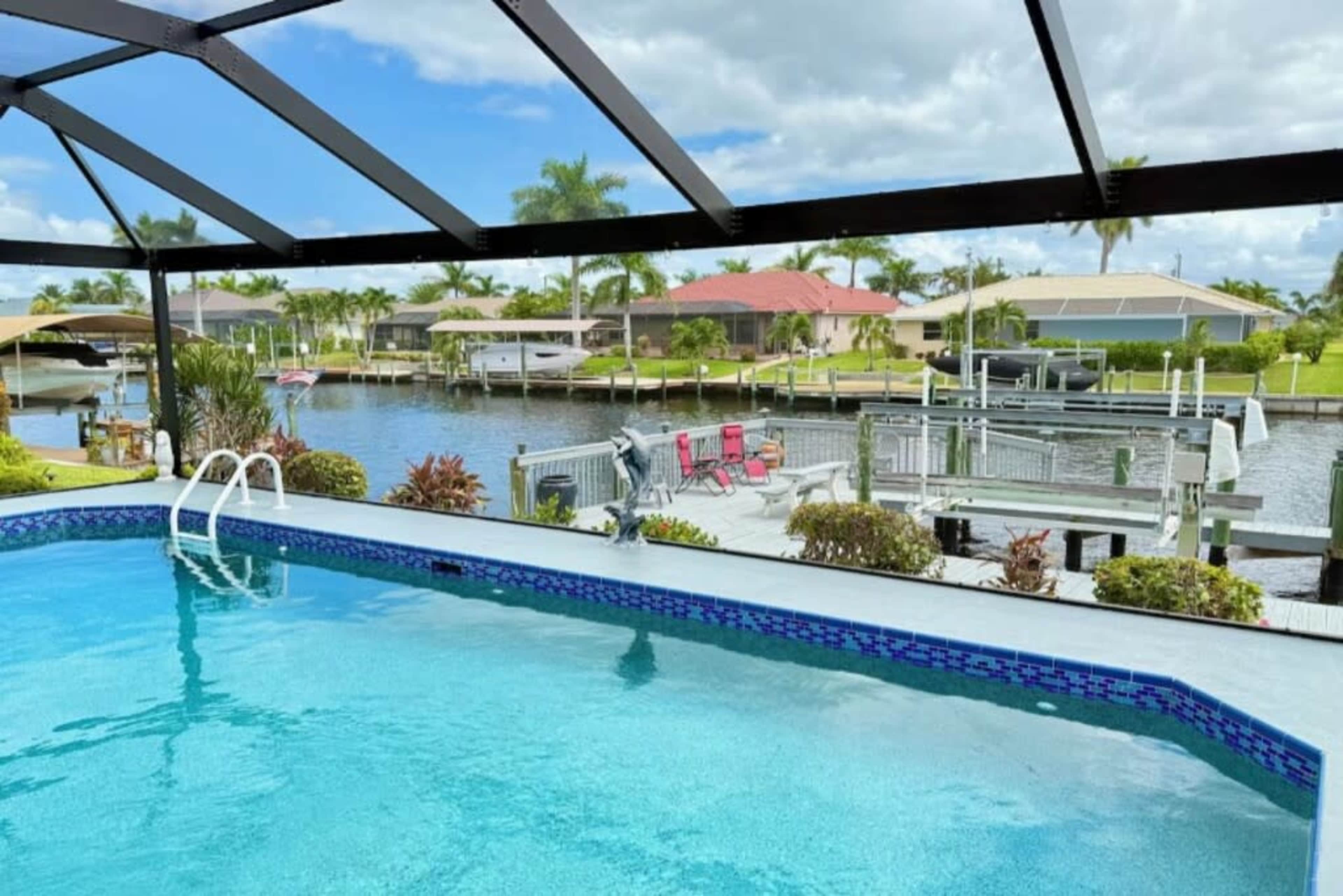 Heated Pool/Waterfront/Canal/Dock/Gulf Access, Private Sunny Home Image in Pelican, Cape Coral, FL