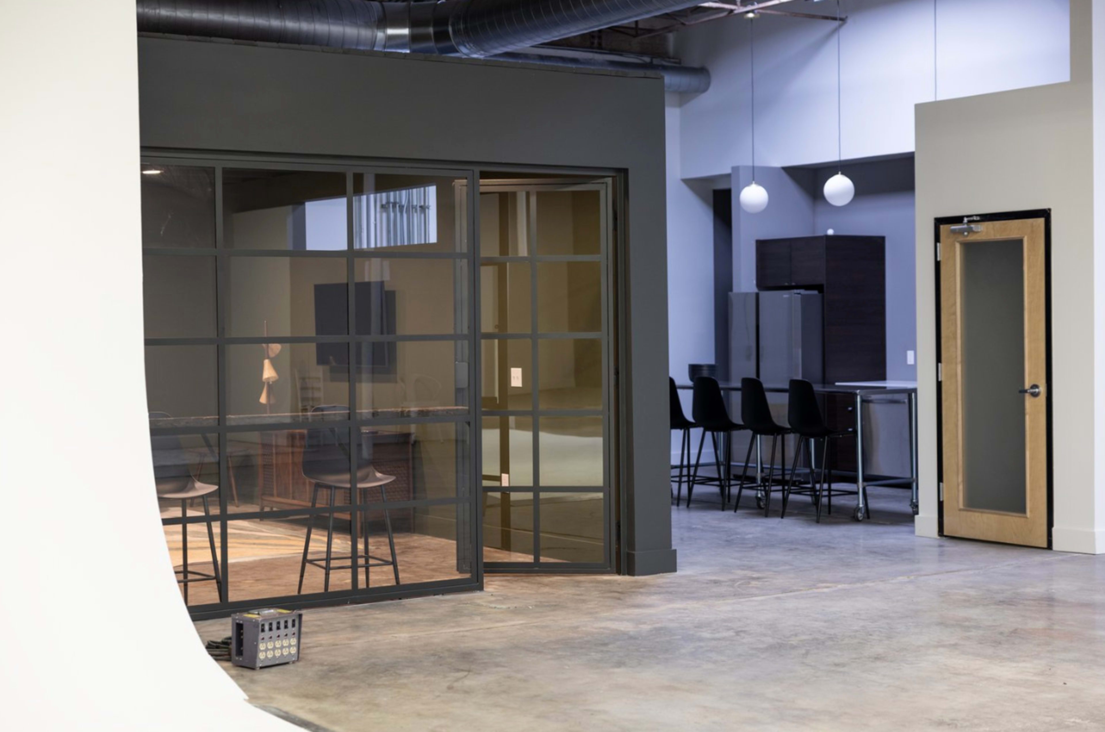 Mid Century Modern Event Space for micro weddings, film screenings, product launches, book clubs, conferences, workshops, offsites, meetings, etc. Image in Adair Park, Atlanta, GA