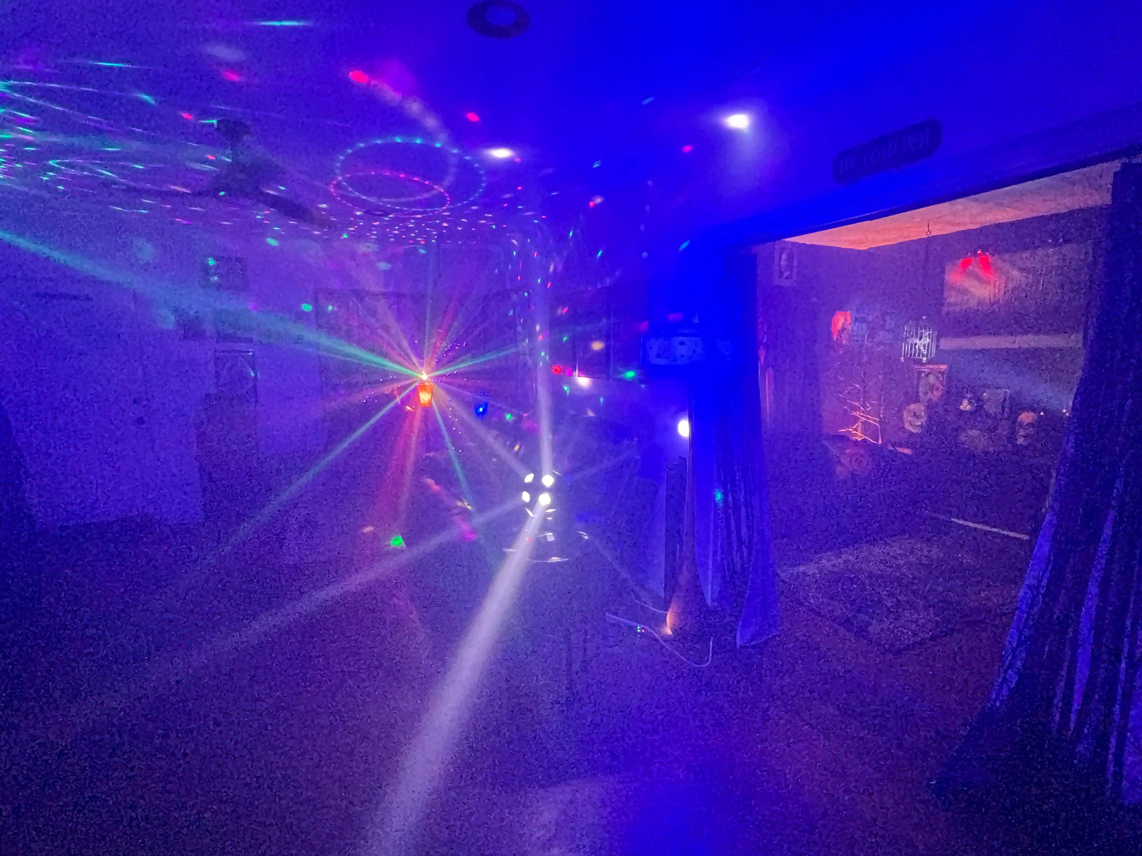 A unique house mixing mid-century modern with Victorian era gothic. Dancefloor with fog & lights, large backyard with stage, firepit & hot tub! Image in Alhambra, Phoenix, AZ