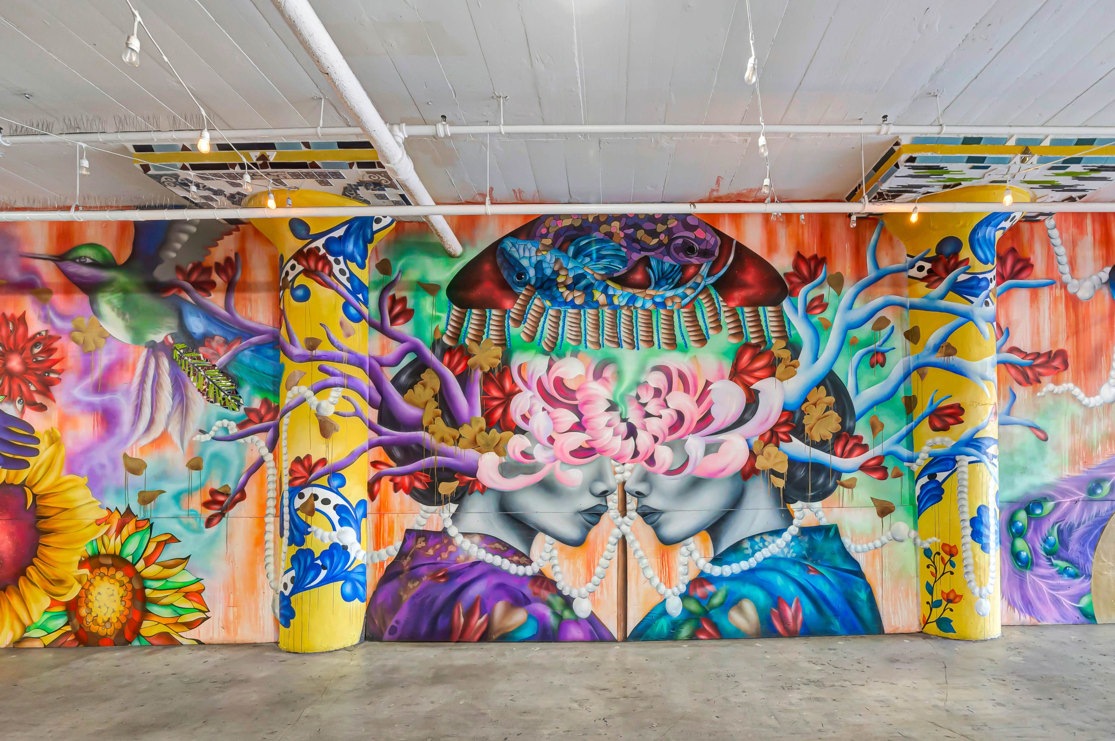 Immersive Industrial Corridor with Vibrant Floor-to-Ceiling Murals Image in Central LA, Los Angeles, CA
