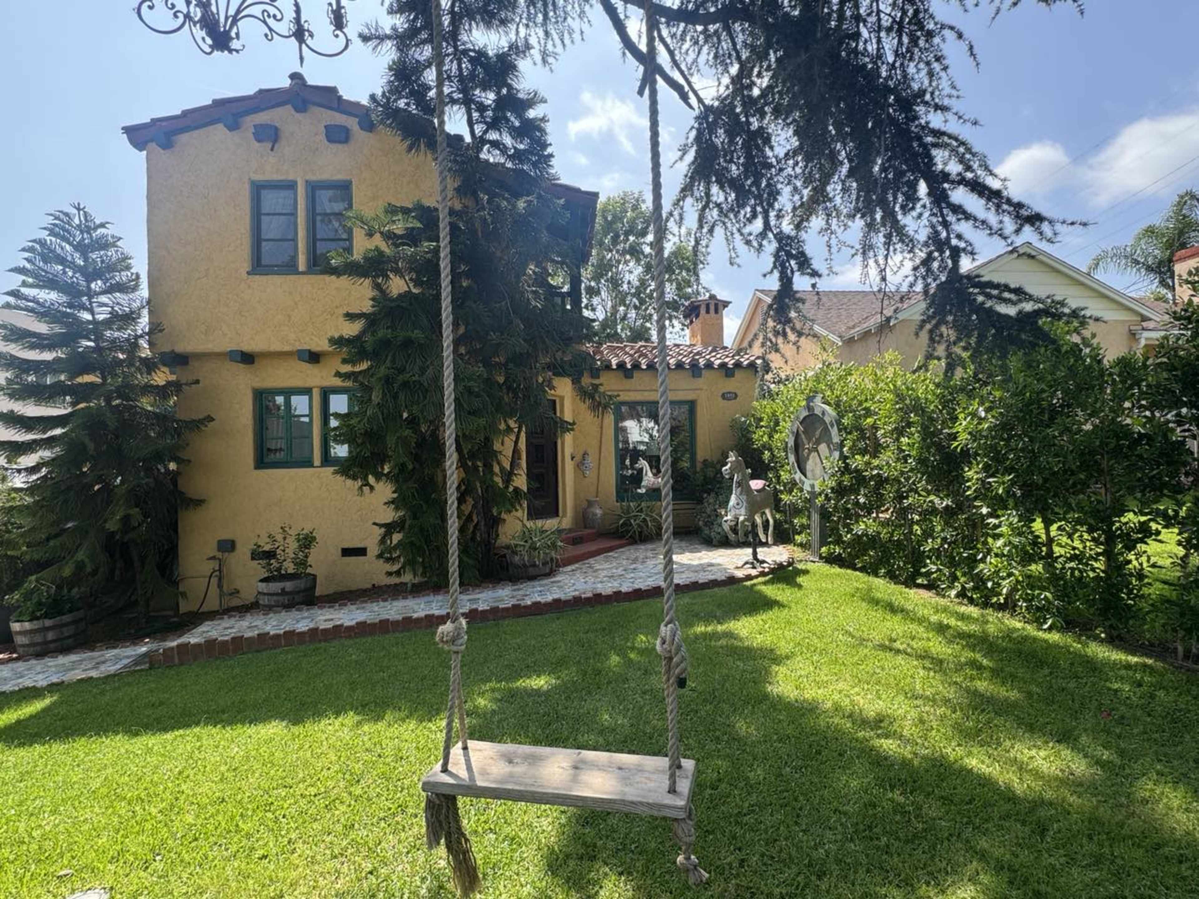 Scenic Spanish-Style Home with Expansive Yards, Sunroom, Citrus Orchard & Storybook Cottage Image in Glenwood, Glendale, CA