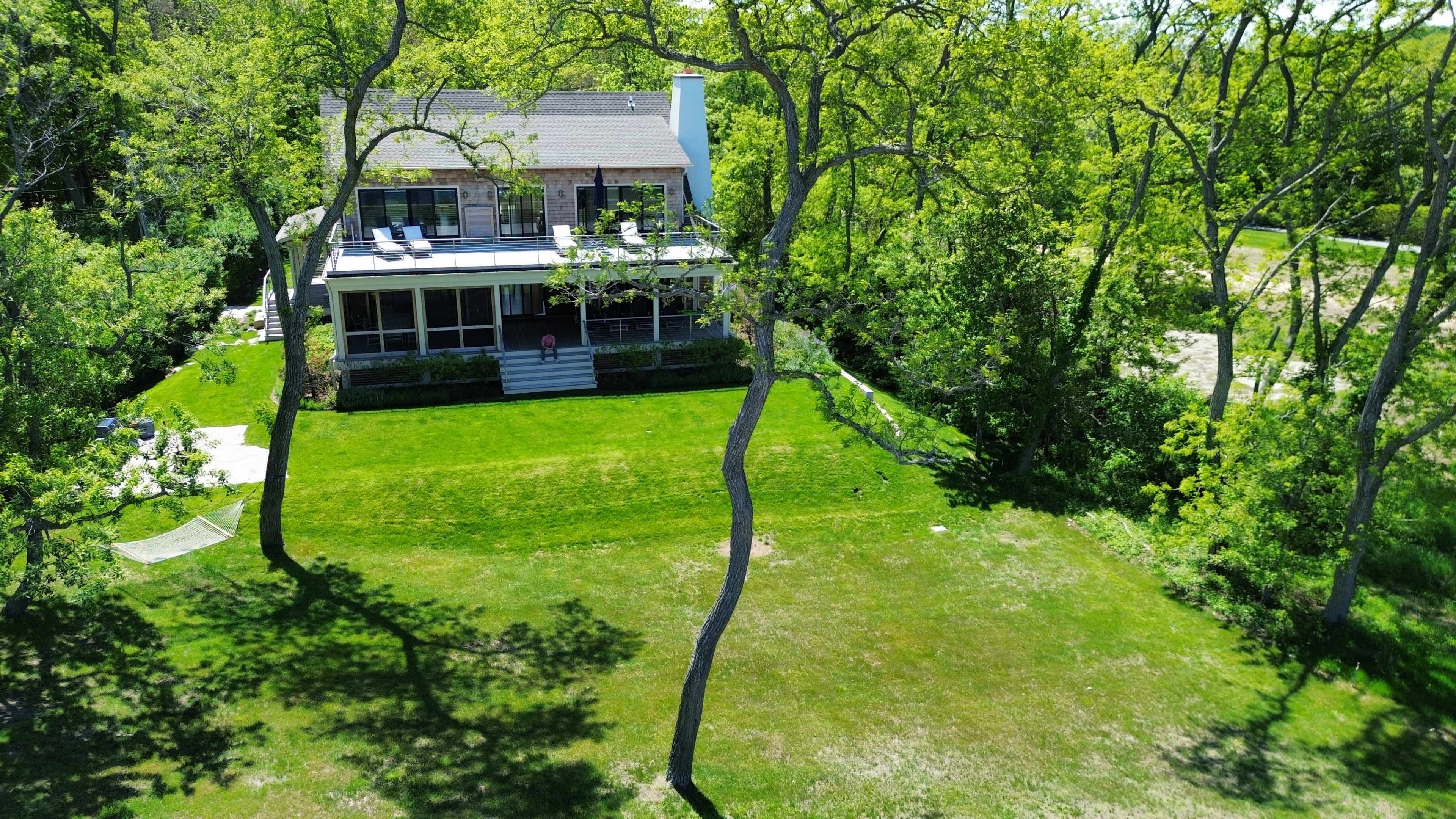 Gorgeous new home on the beach With STUNNING views of the LI Sound and vivid colorful sunsets Image in North Fork, Peconic, NY
