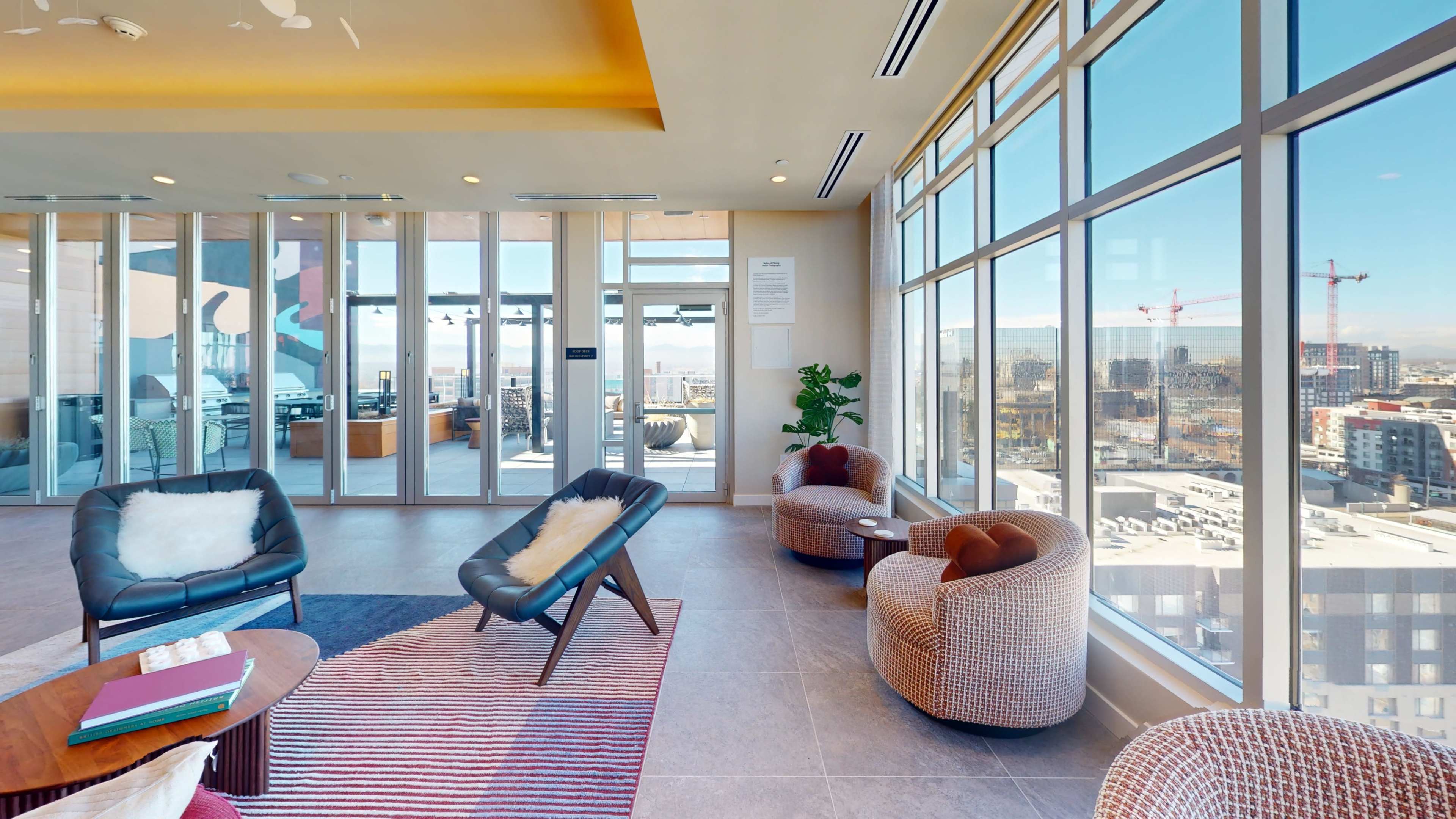 Private enclosed rooftop lounge with view of downtown Denver! Image in Speer, Denver, CO