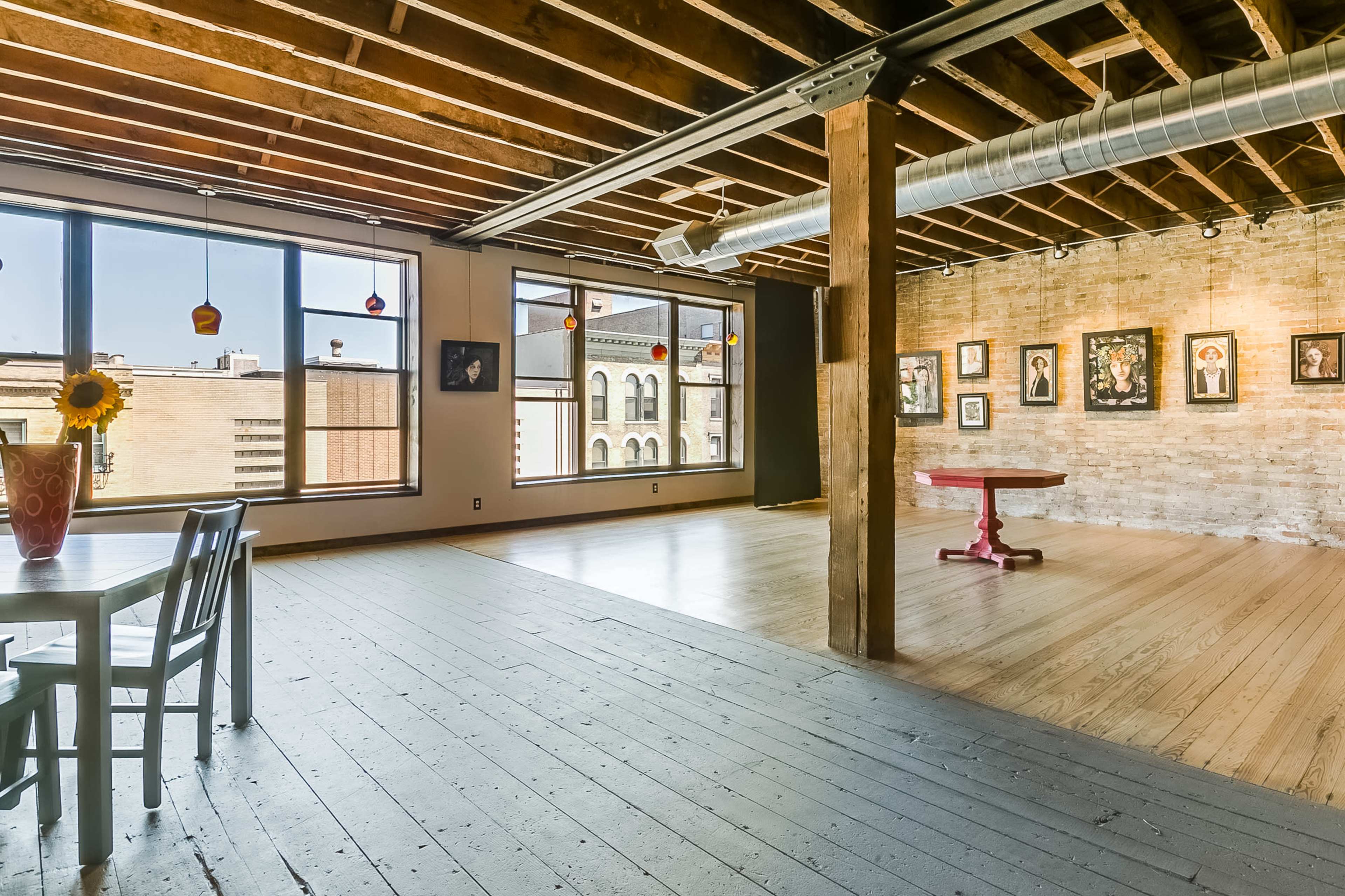 Chic, historic  loft with natural light and artistic charm. Image in Racine, Racine, WI