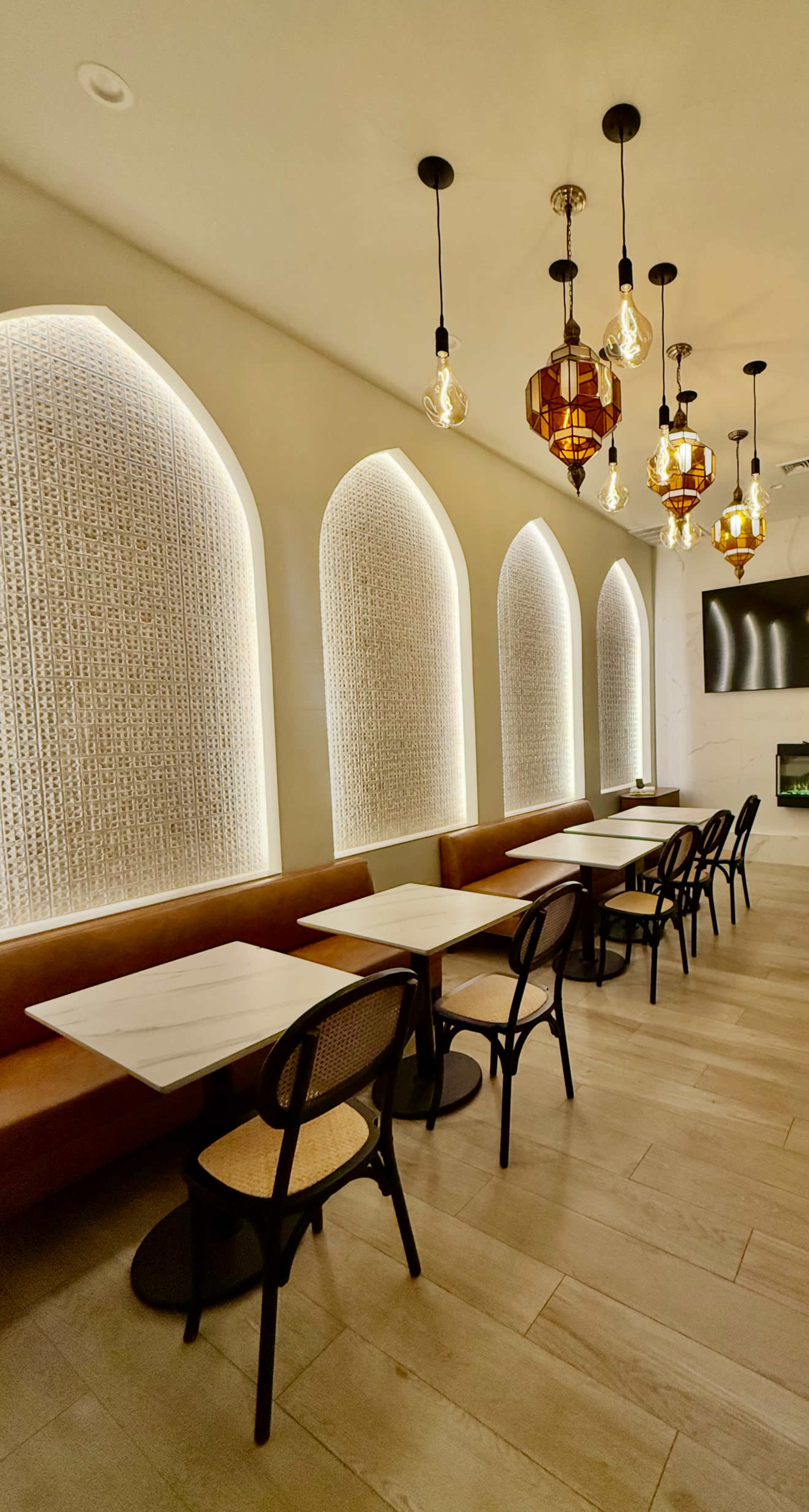 Warm, Luxurious Private Room with Cultural Murals in a Cafe Image in North Philadelphia, Philadelphia, PA