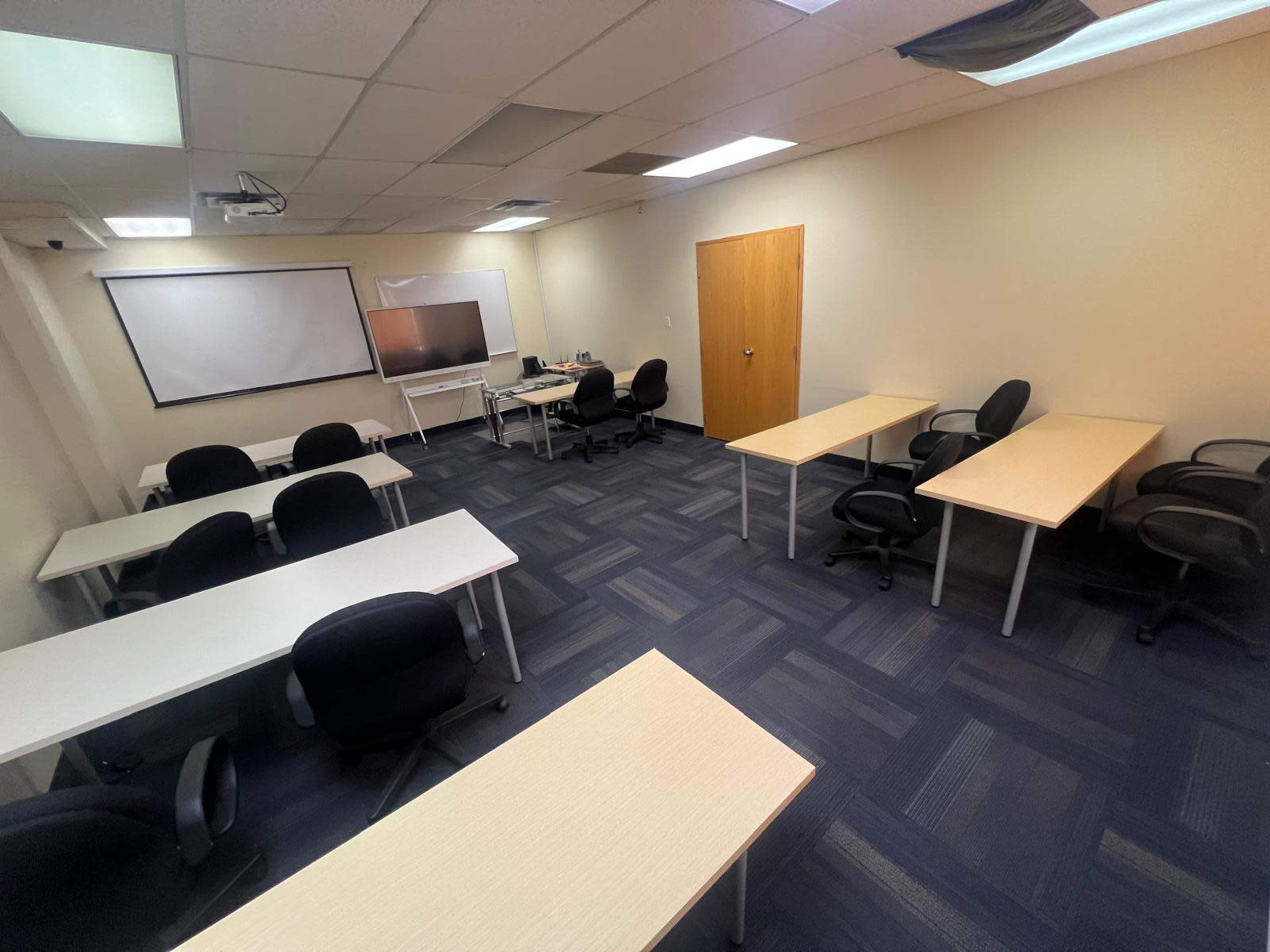 Modern Conference Room for 15 | Training & Meeting Space | Projector, Shared Kitchen & Common Area in Mississauga" Image in Mississauga, Mississauga, Canada L4W 1E3, ON