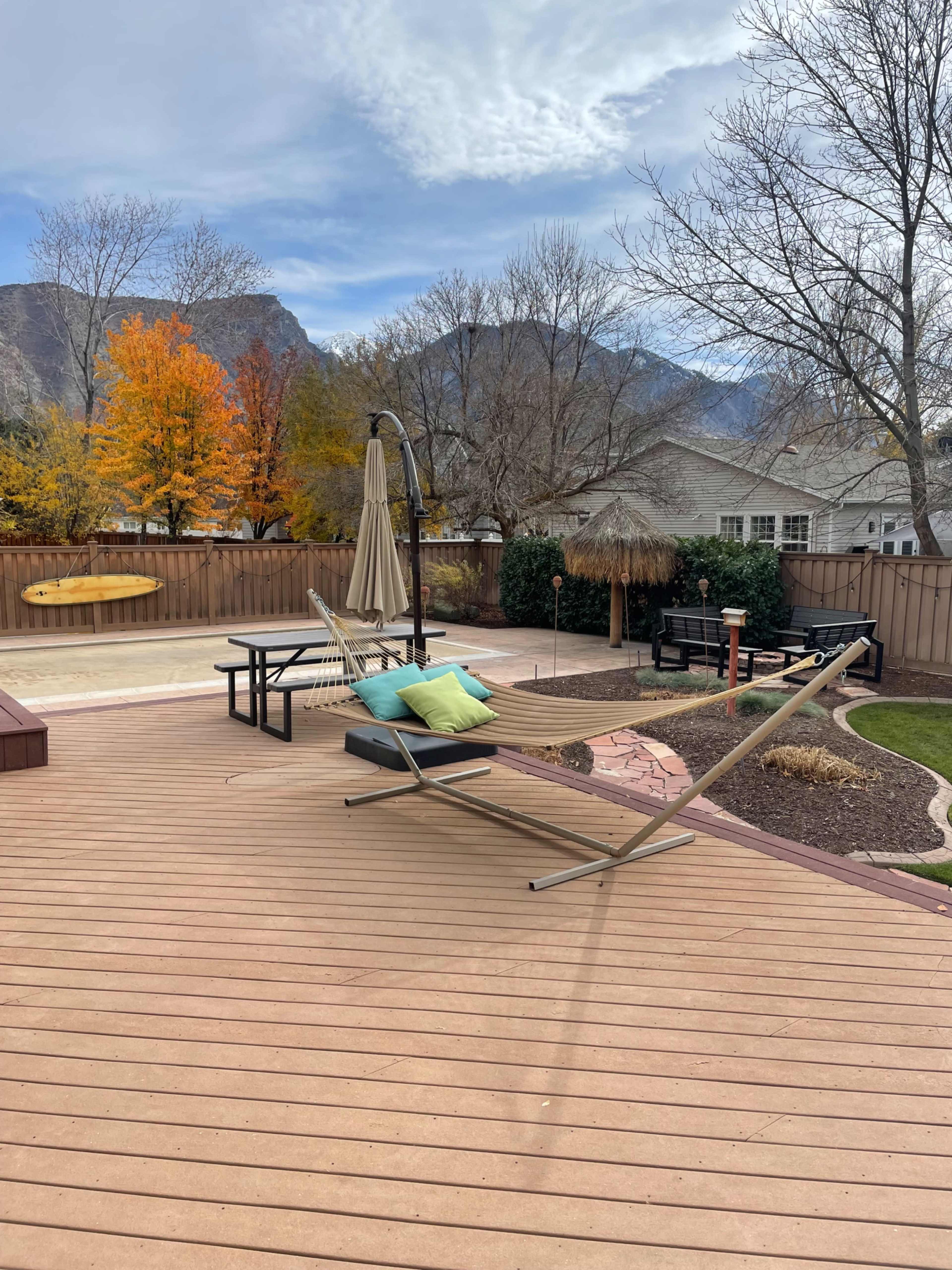Beachy style home surrounded by mountains with a swimming pool Image in River Bottoms, Provo, UT