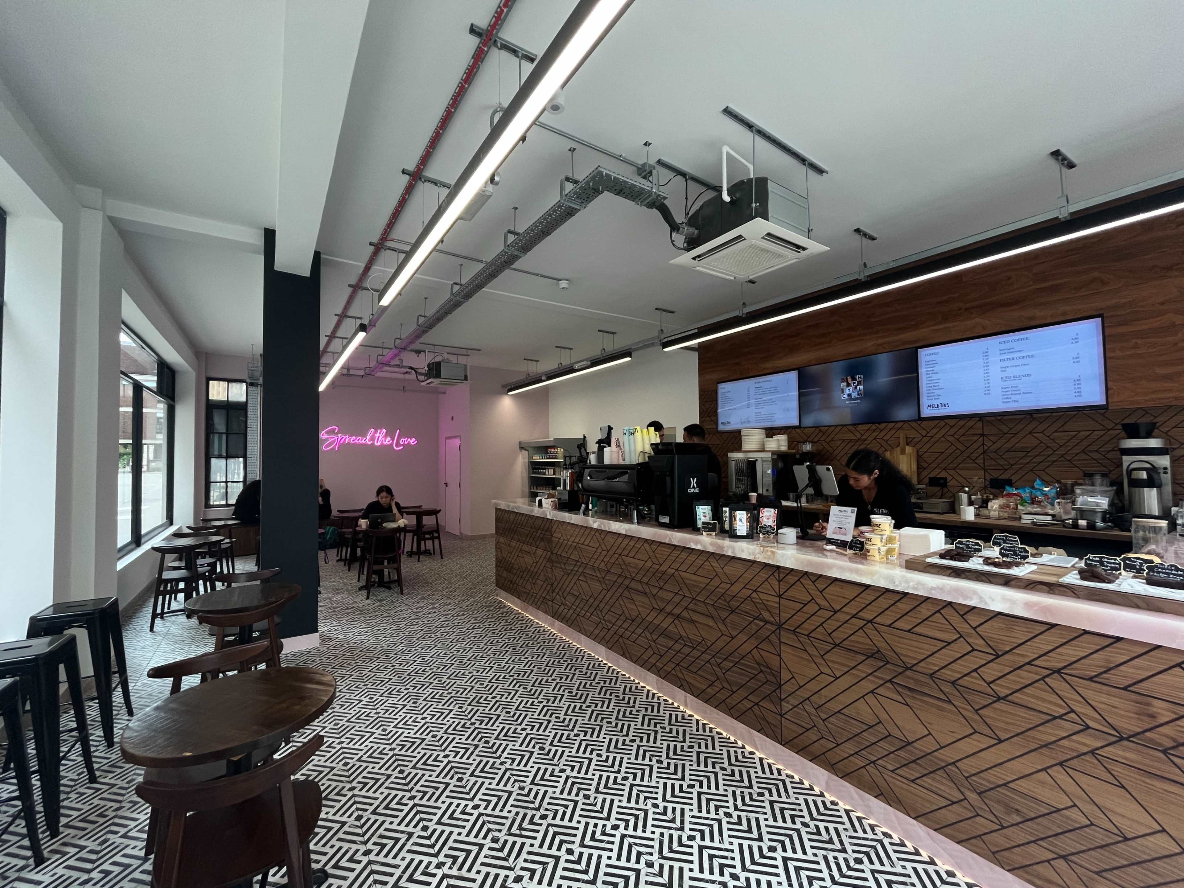 Sunny High Holborn Cafe with Chic Pink Accents Image in Holborn, London, ENG