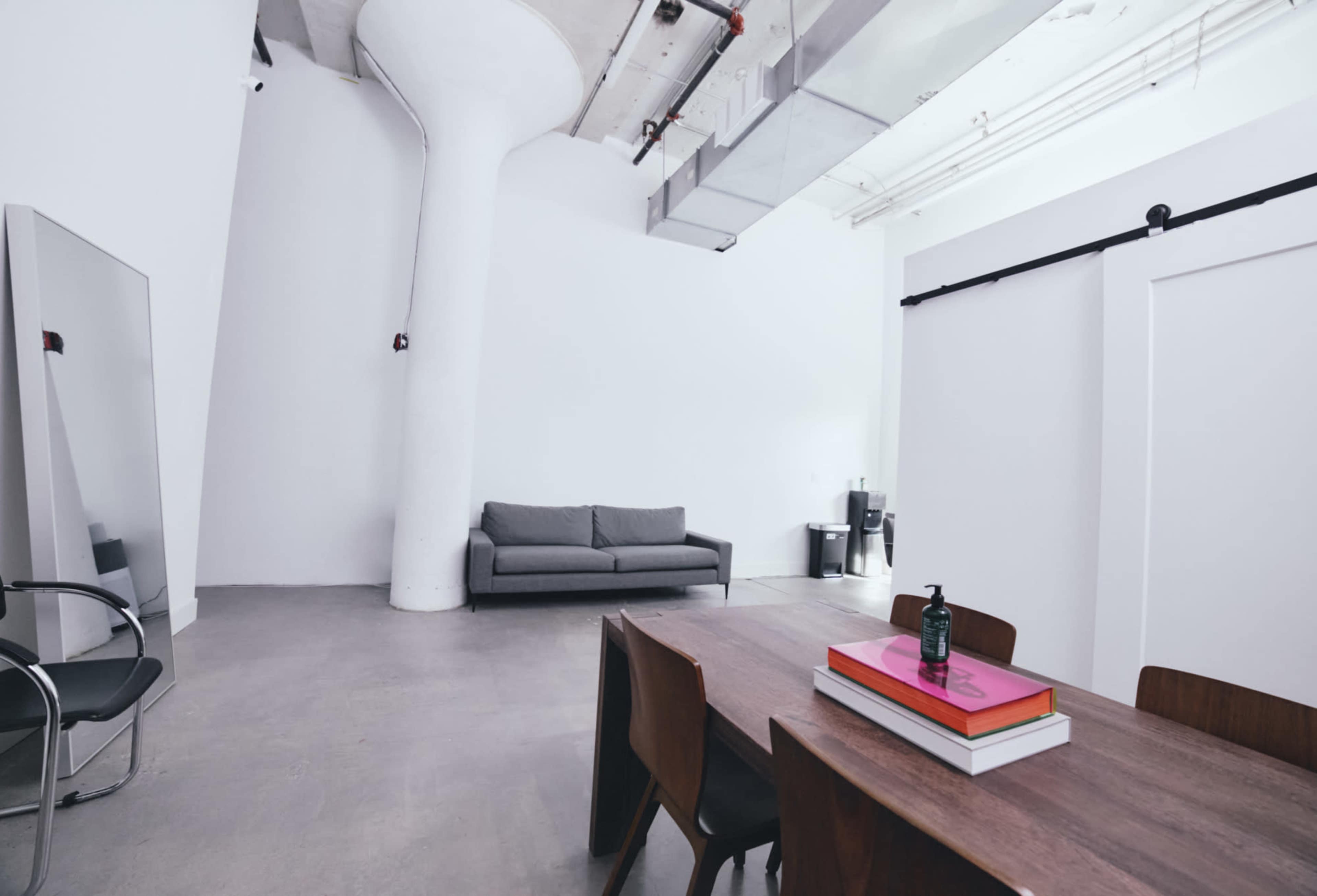 All white photo/video studio with CYC wall and concrete floors. White Rabbit Studio Image in Long Island City, Long Island City, NY