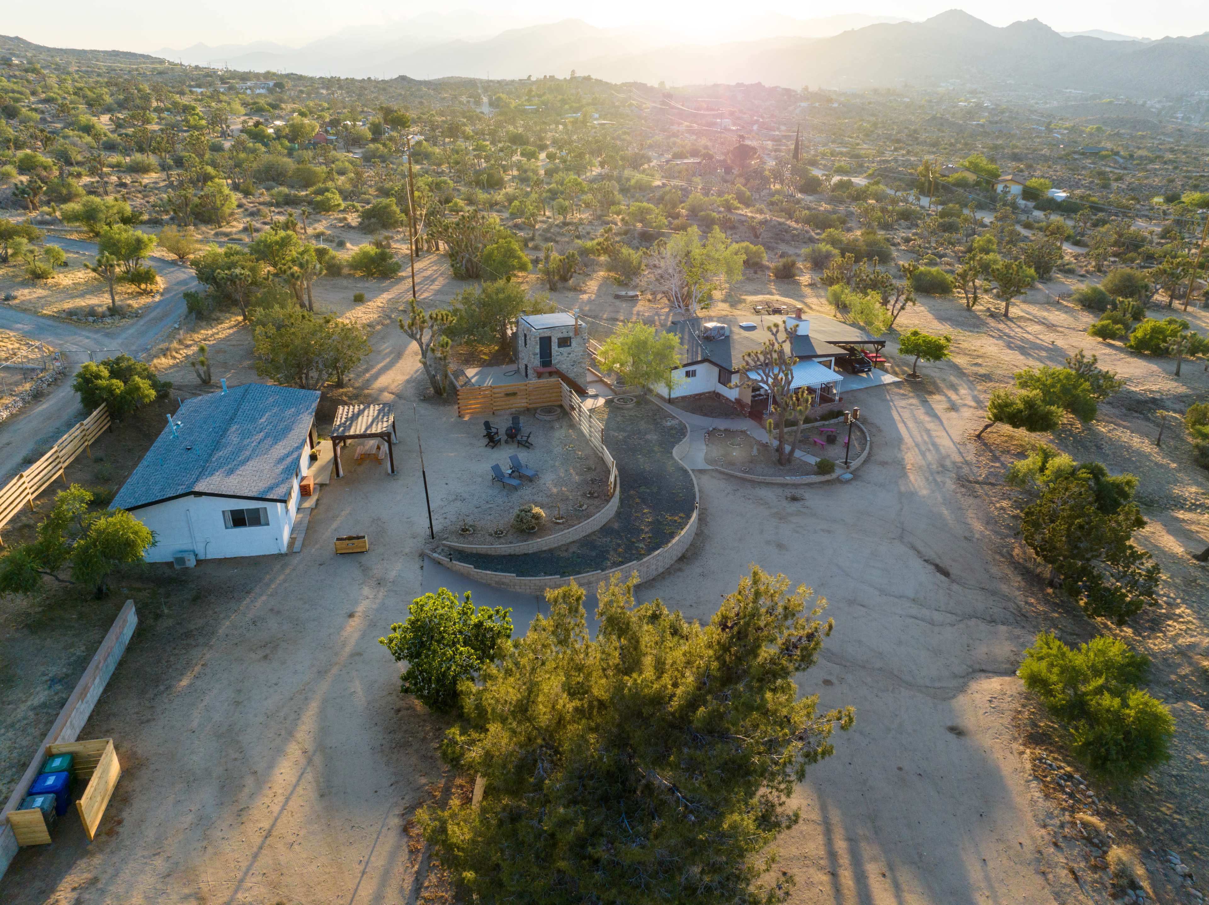 Secluded house, casita and rock tower on 3.5 acres of beautiful hillside desert land with joshua trees Image in Yucca Valley, Yucca Valley, CA