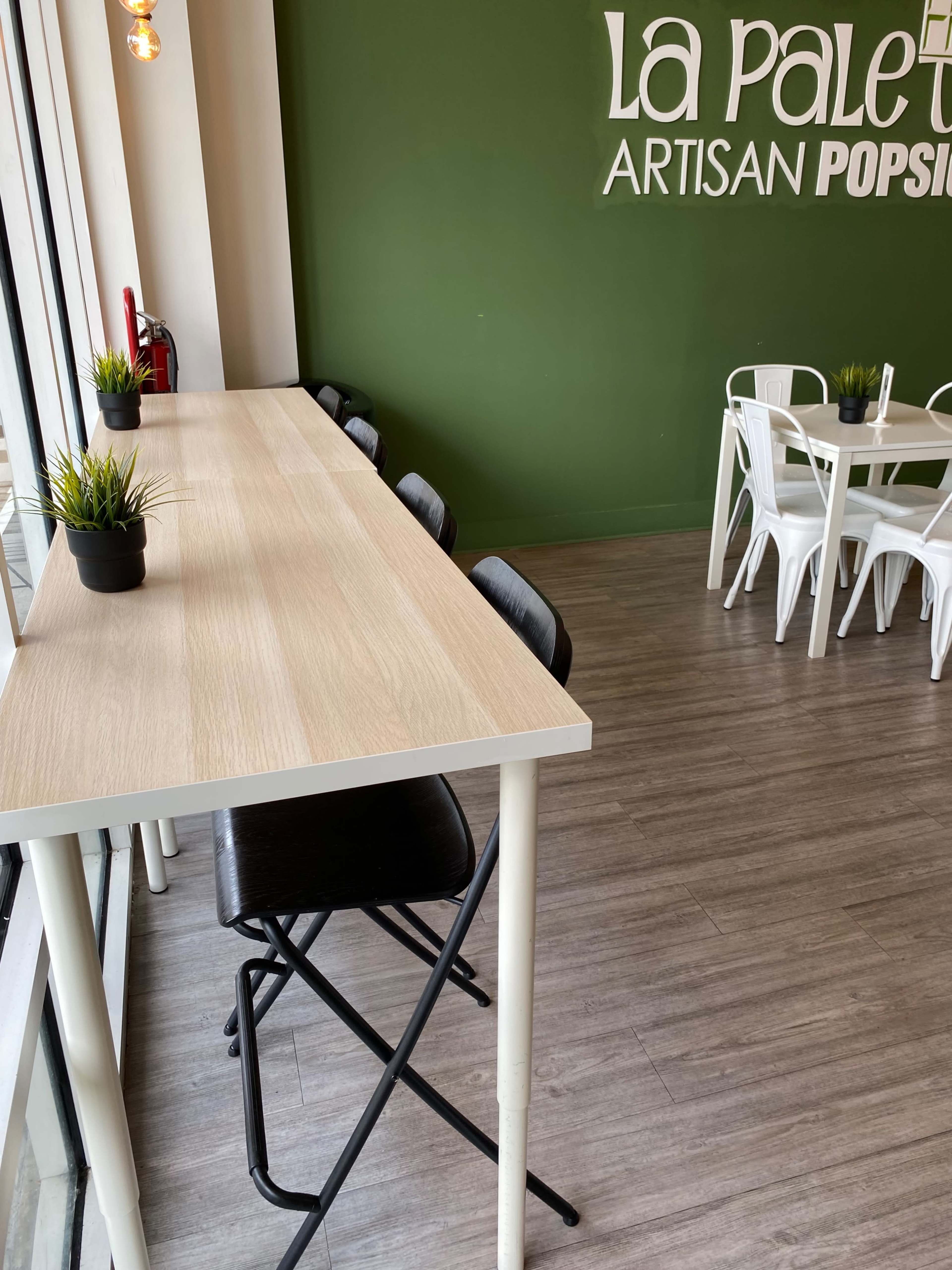 An Ice Cream space with tables, chairs, super Clean restrooms and free wifi. Image in Deerfield Village, Orlando, FL