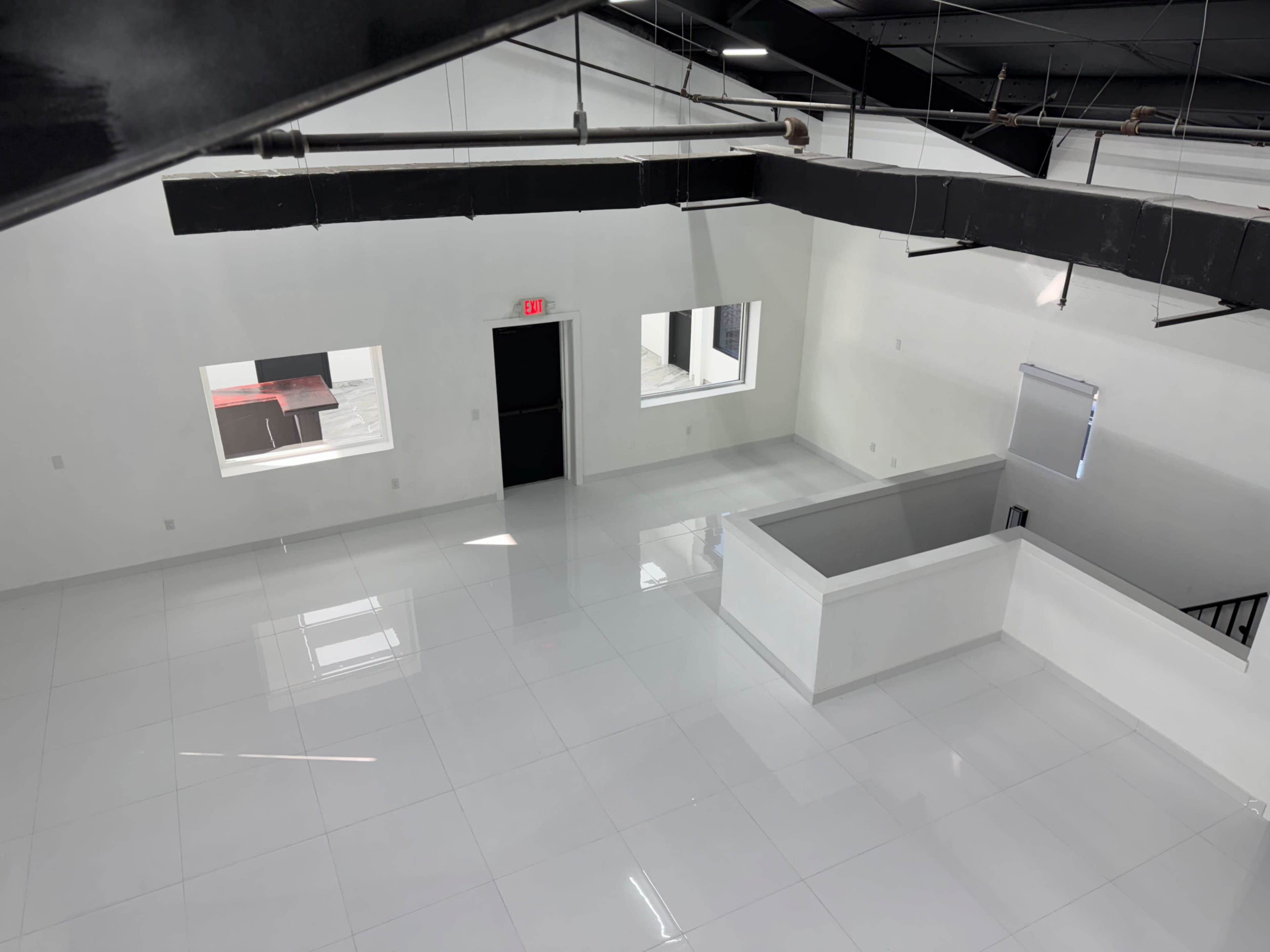 Modern 4,000 Sq Ft Industrial Creative Studio with Bar Set | Photo + Video Production Image in Mid West, Houston, TX