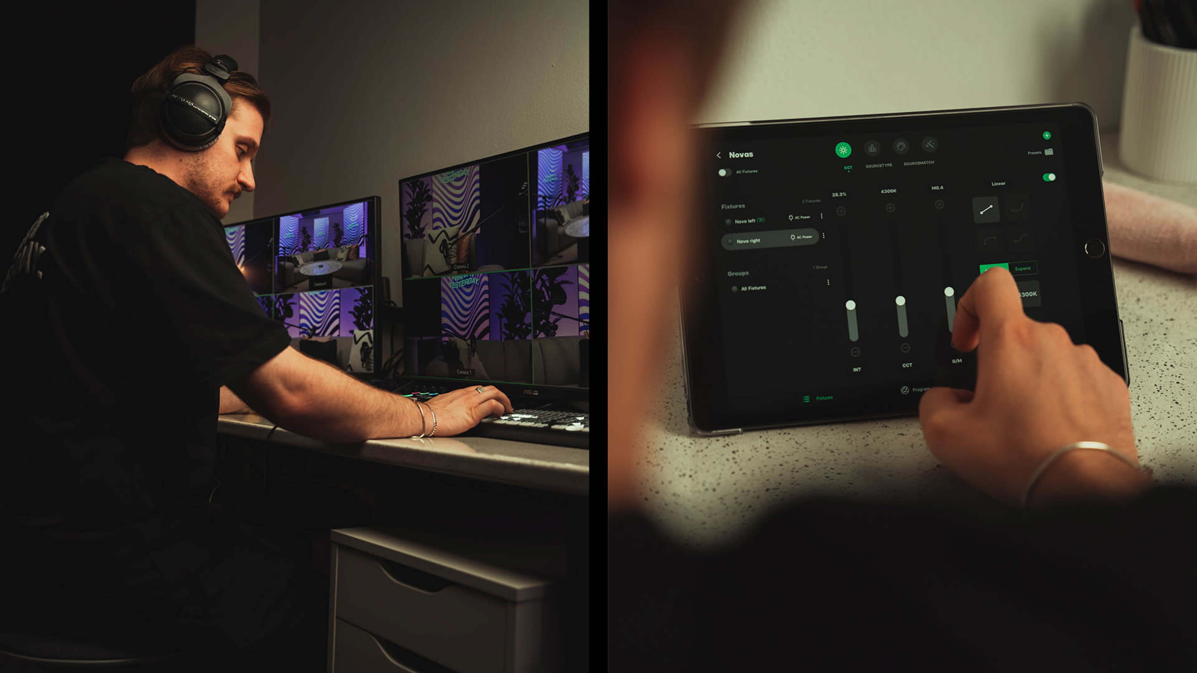 A person wearing headphones is adjusting settings on a computer at a desk with multiple monitors, while another person's hand is using a tablet to control audio mixing software.
