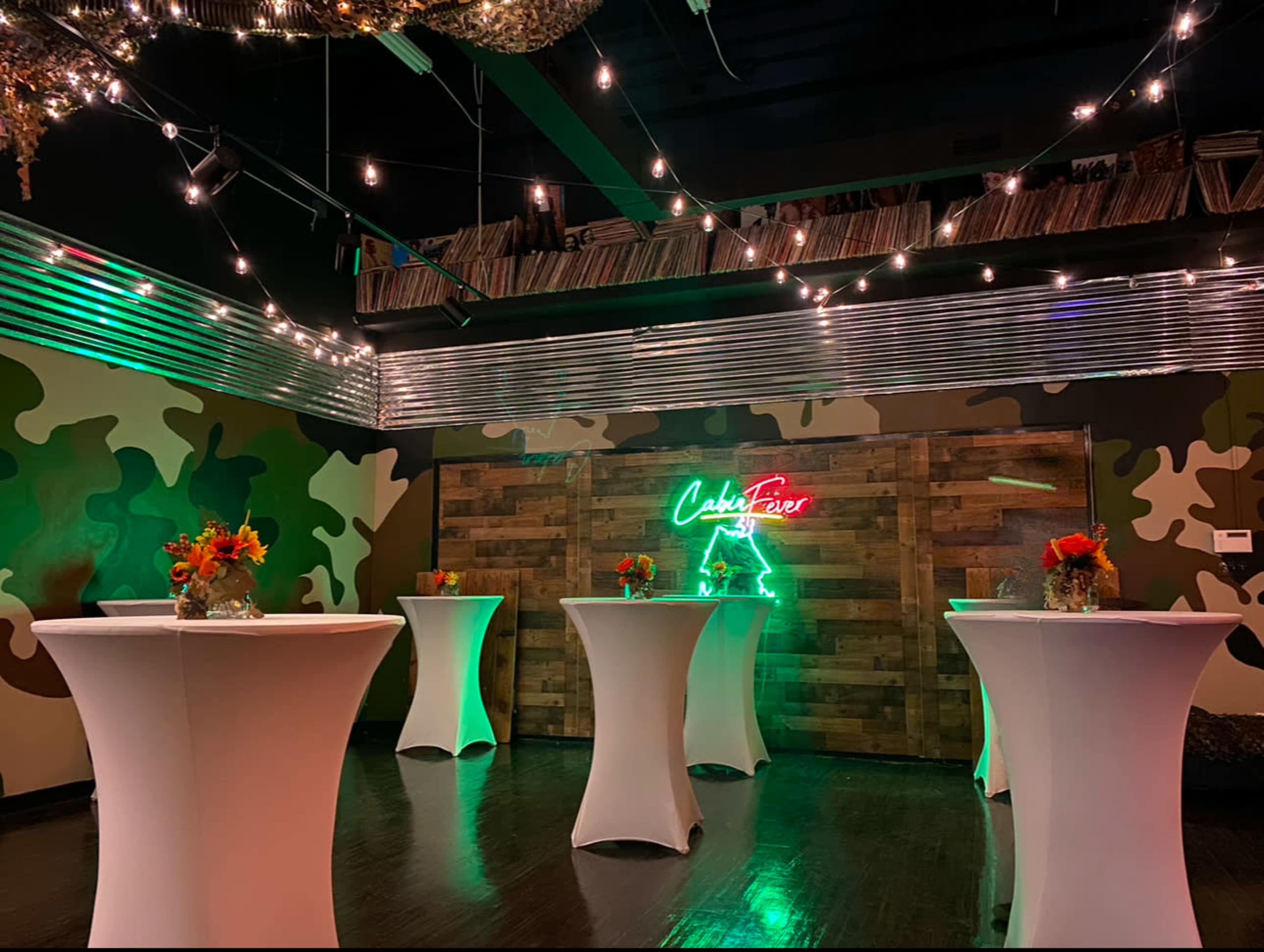 Indoor/Outdoor Ambience, prop log cabin with porch/stage, venue Image in Winston-Salem, Winston-Salem, NC