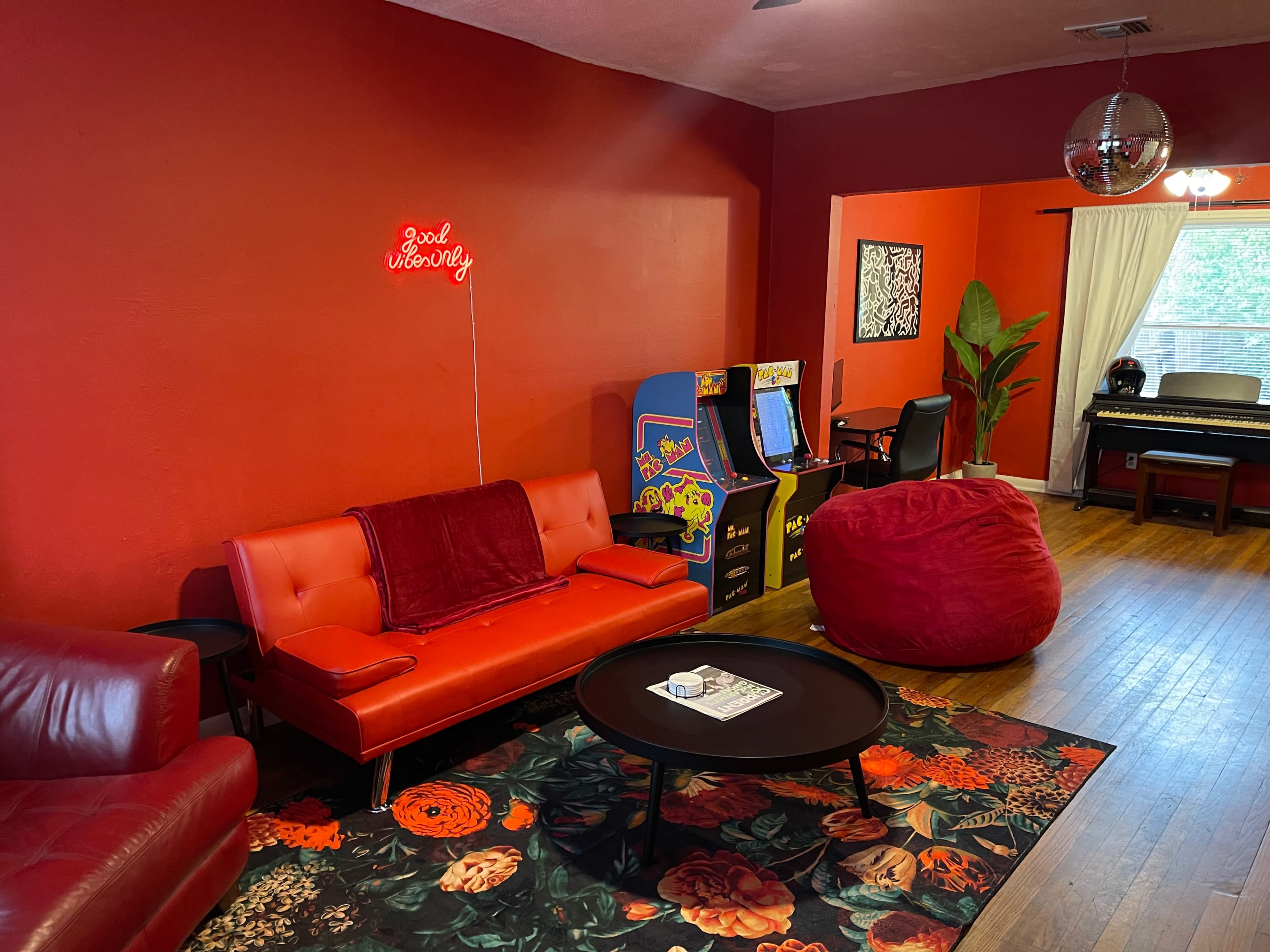 Bold Red Pop-Art Creative Space w/ Arcade Games, Piano & Neon Image in Olmos Park Terrace, San Antonio, TX