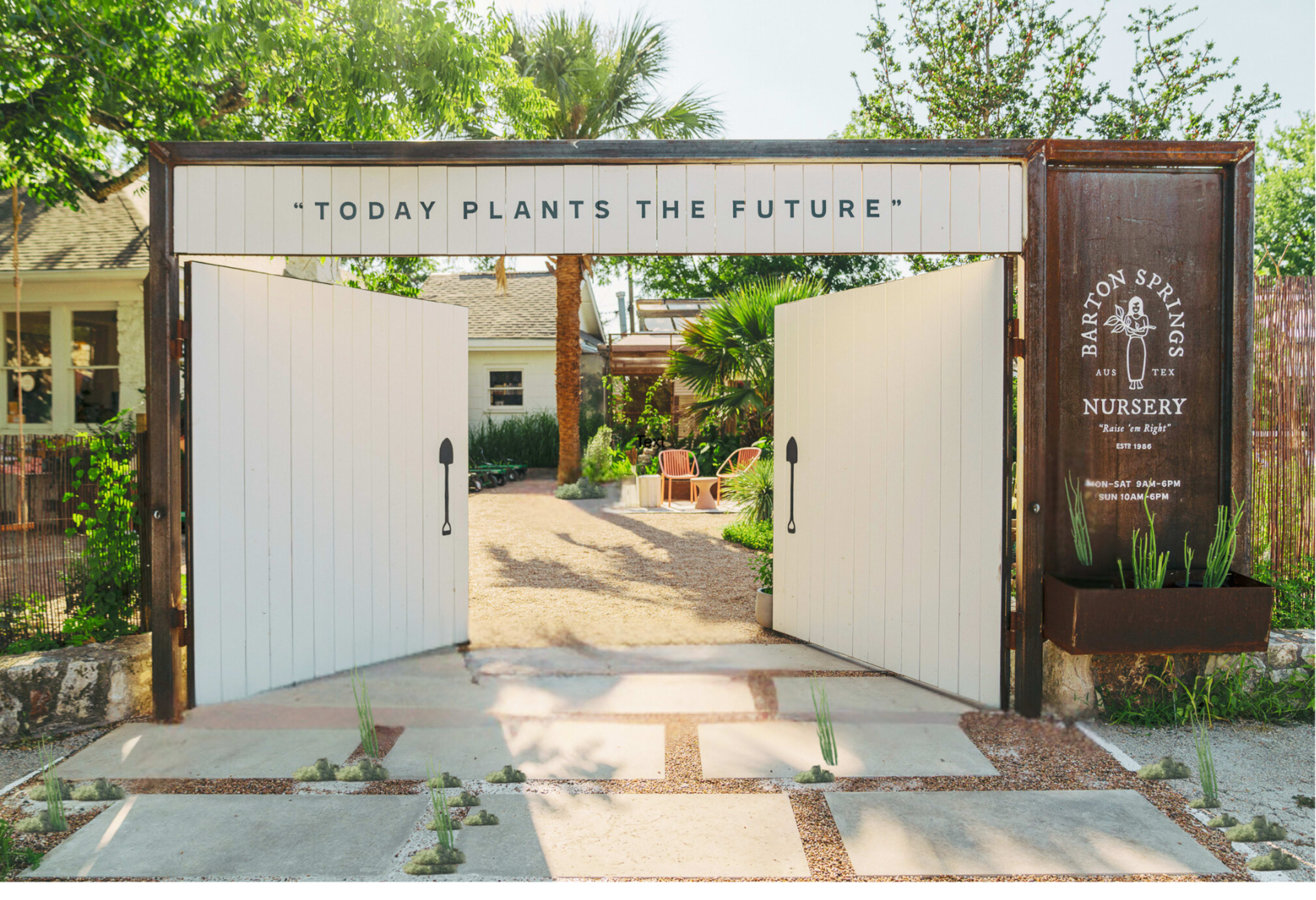 A white wooden gate with the phrase "TODAY PLANTS THE FUTURE" opens into a gravel path lined with plants and seating in a nursery.