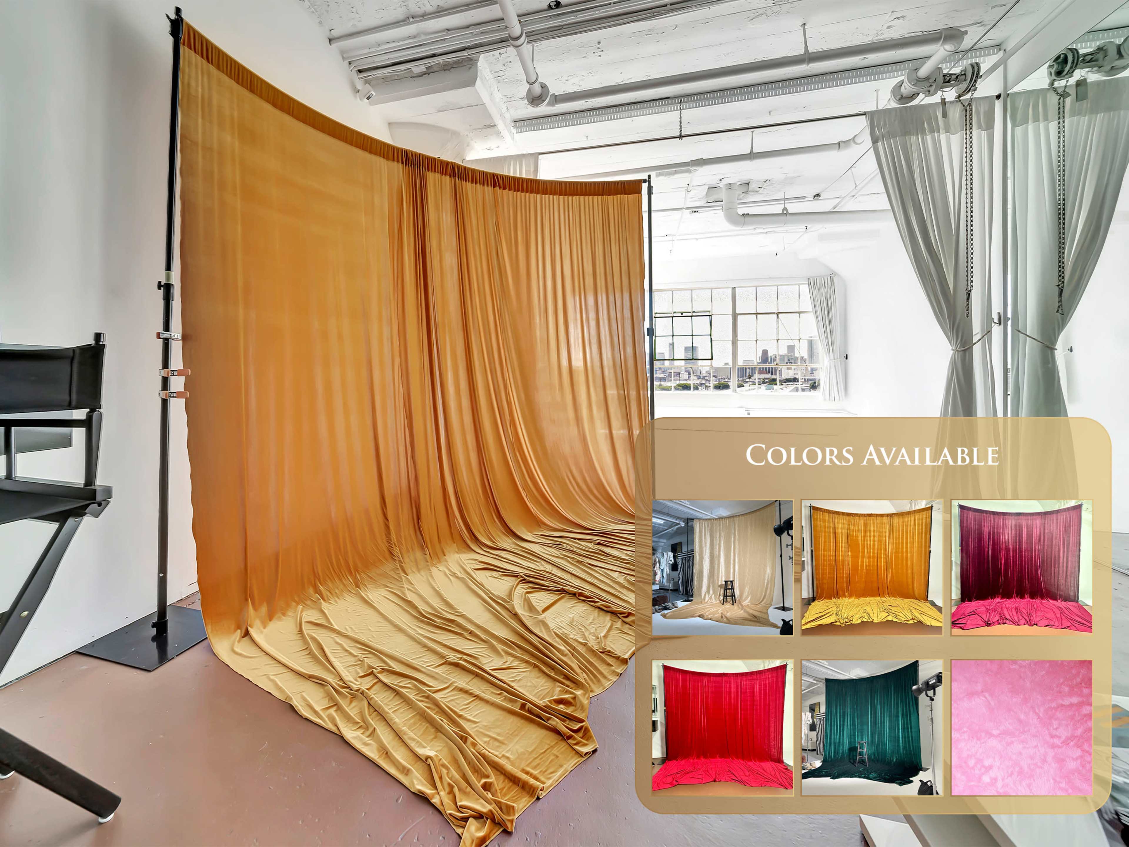 The image shows a photography studio setup with large fabric drapes in shades of gold and a display of various available colors on the side.