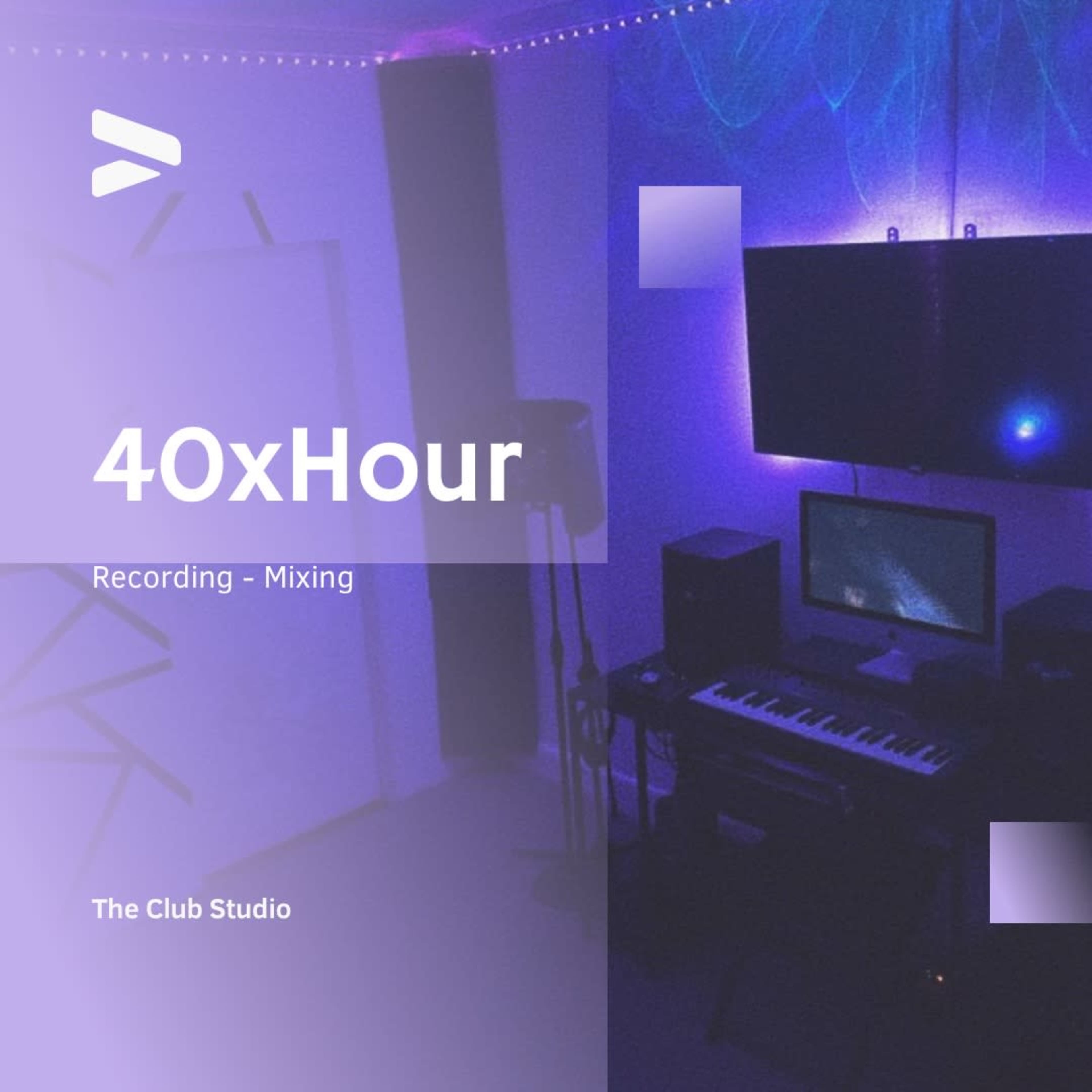 A recording studio setup with a keyboard, computer monitor, and ambient lighting.