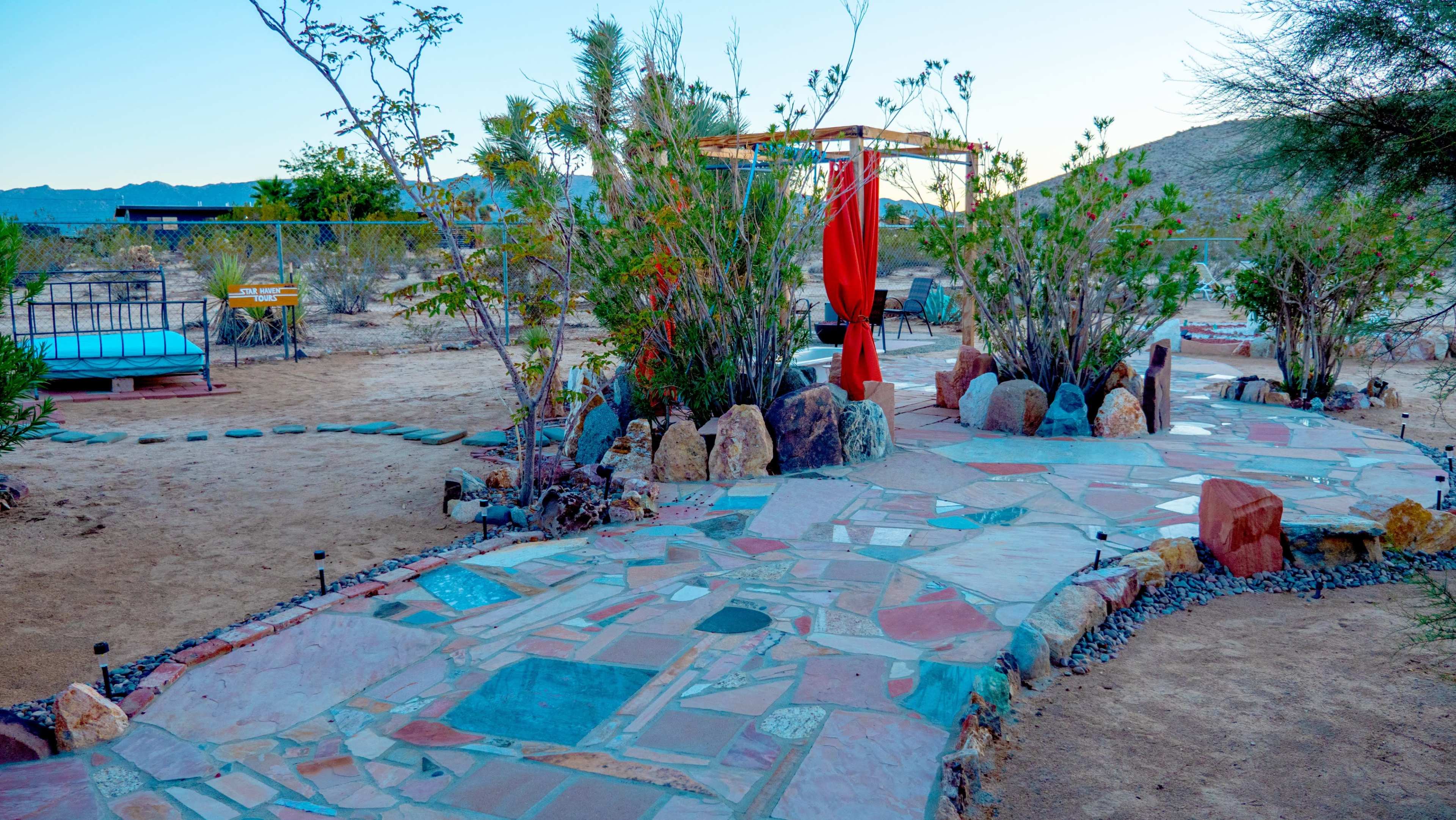 Eclectic Stone Art Home with Secluded Desert View Image in , Joshua Tree, CA